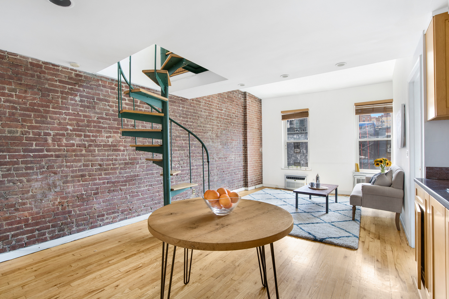 40 West 76th Street, Unit 10 Manhattan, NY 10023 - Photo 2 of 7 a view of a dining room with furniture and wooden floor