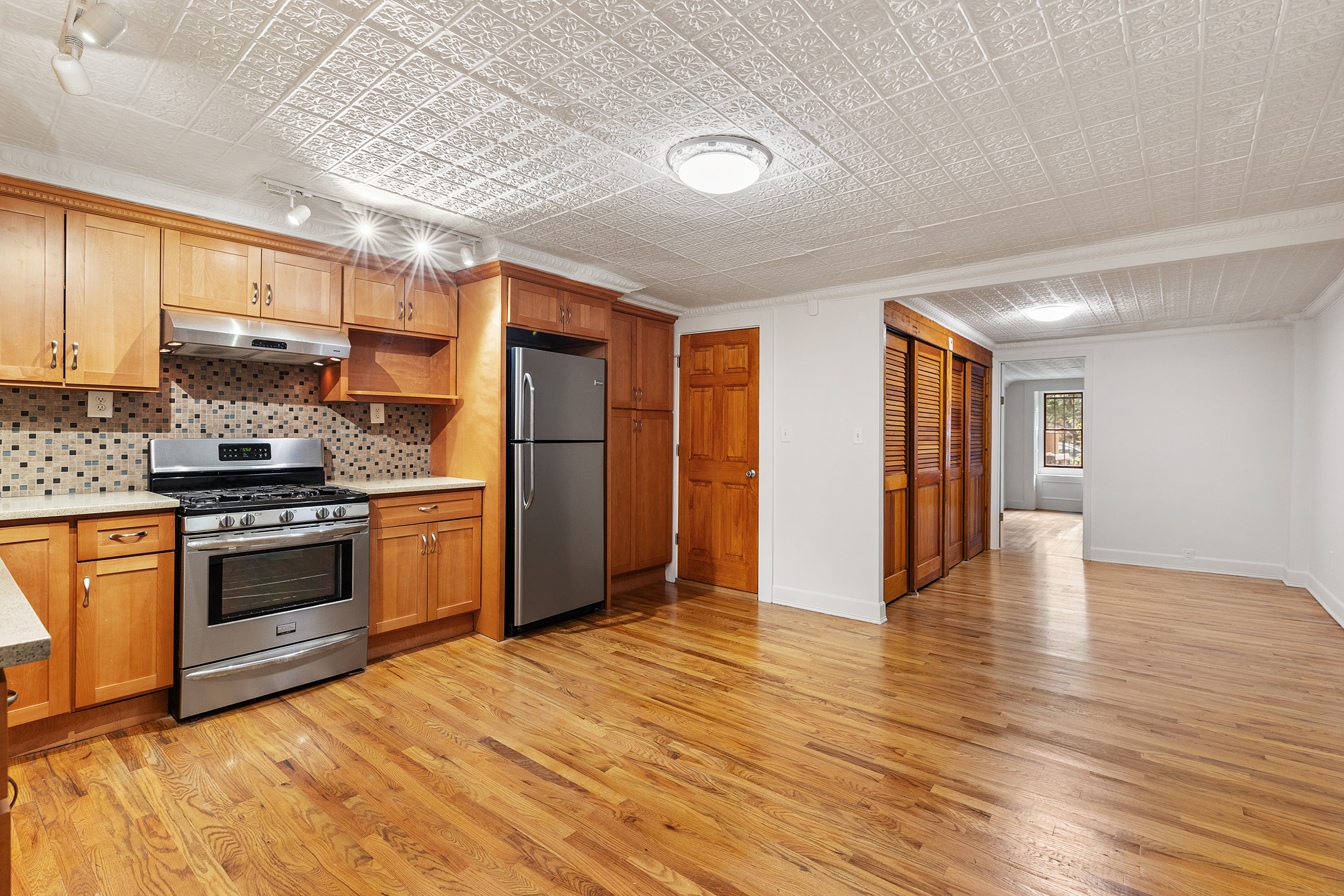115 A 2nd Place Brooklyn, NY 11231 - Photo 20 of 27 a kitchen with stainless steel appliances granite countertop a refrigerator stove and sink