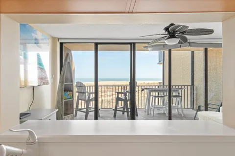 a kitchen that has a stove and a table