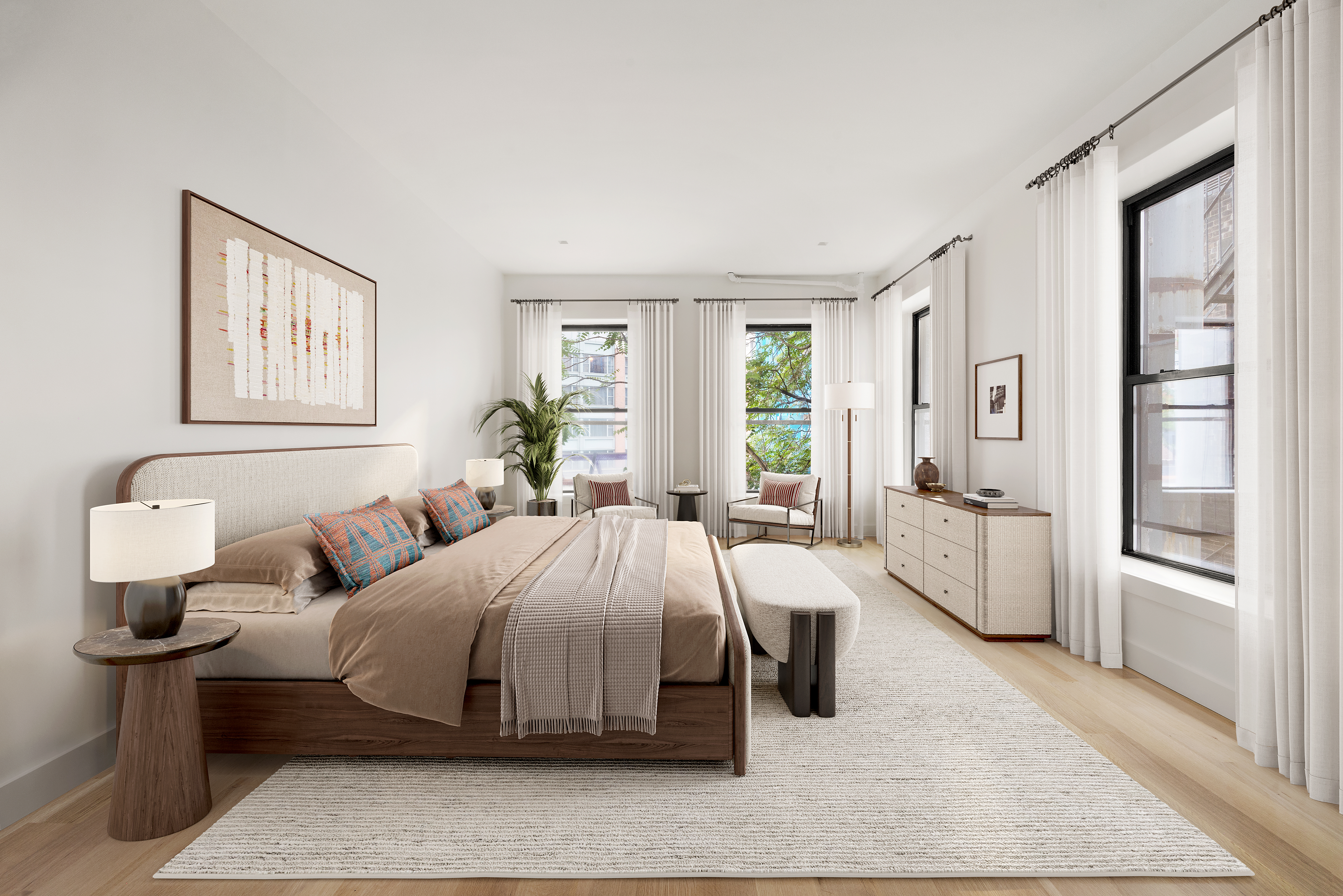 243 West Broadway, Unit 3 Manhattan, NY 10013 - Photo 13 of 25 a bedroom with a large bed and a table