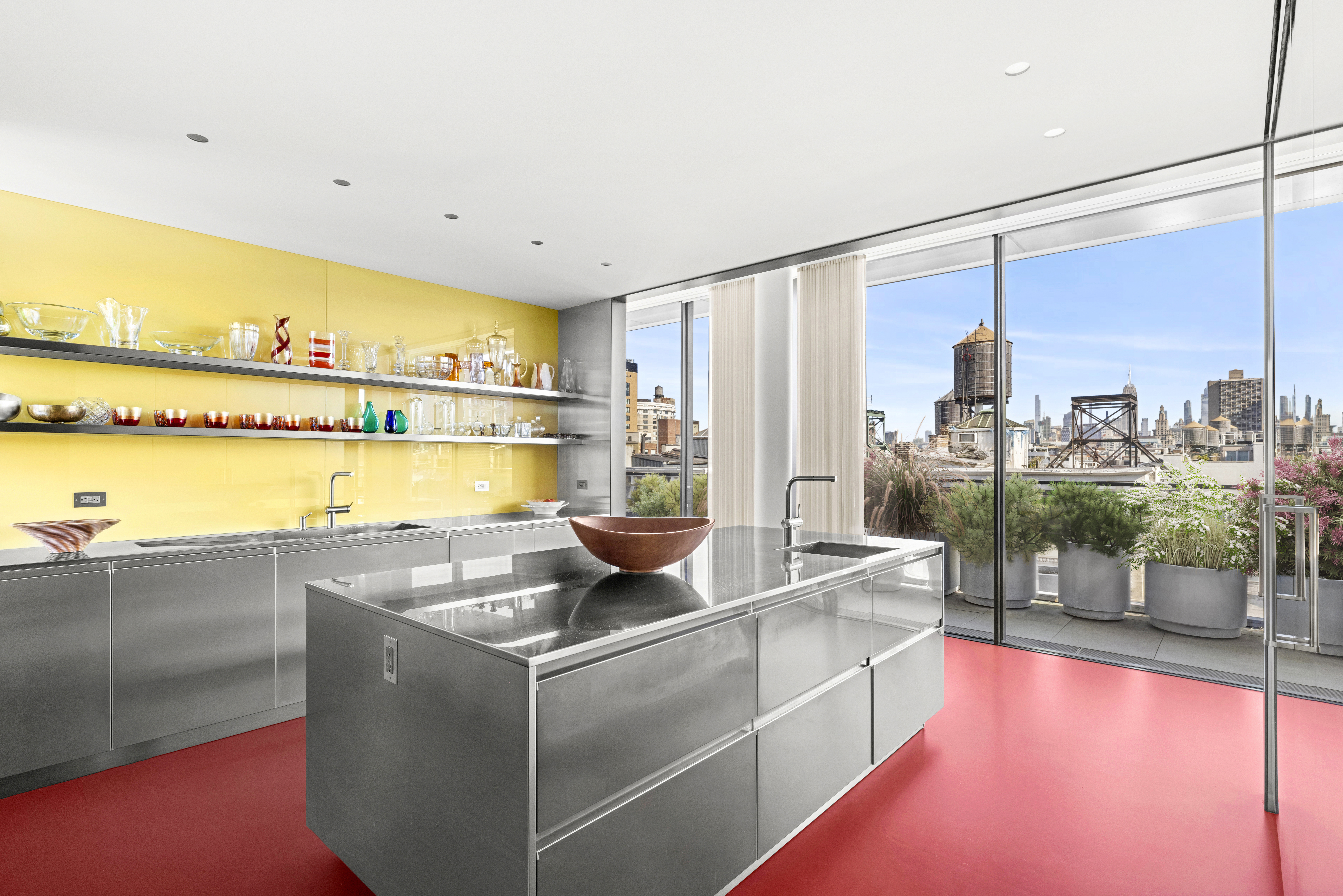 27 Wooster Street, Unit PH Manhattan, NY 10013 - Photo 7 of 34 a kitchen with a sink and a stove top oven