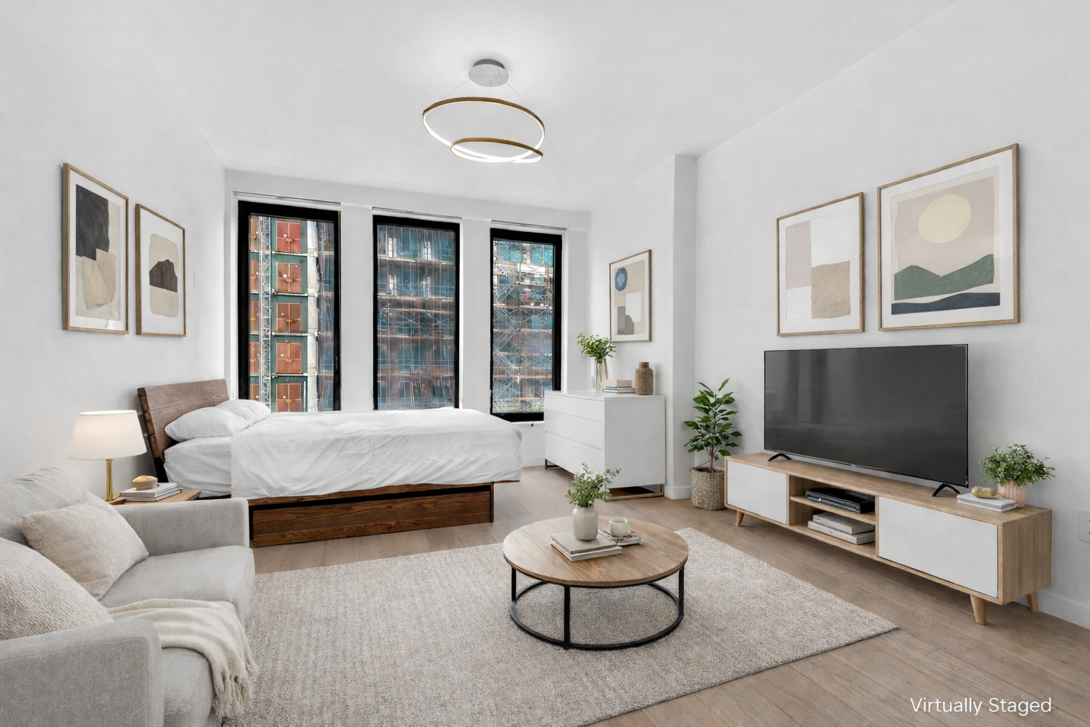 58 St Marks Place, Unit 406 Brooklyn, NY 11217 - Photo 1 of 6 a living room with furniture and a flat screen tv