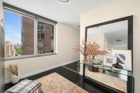a view of a living room and dining room