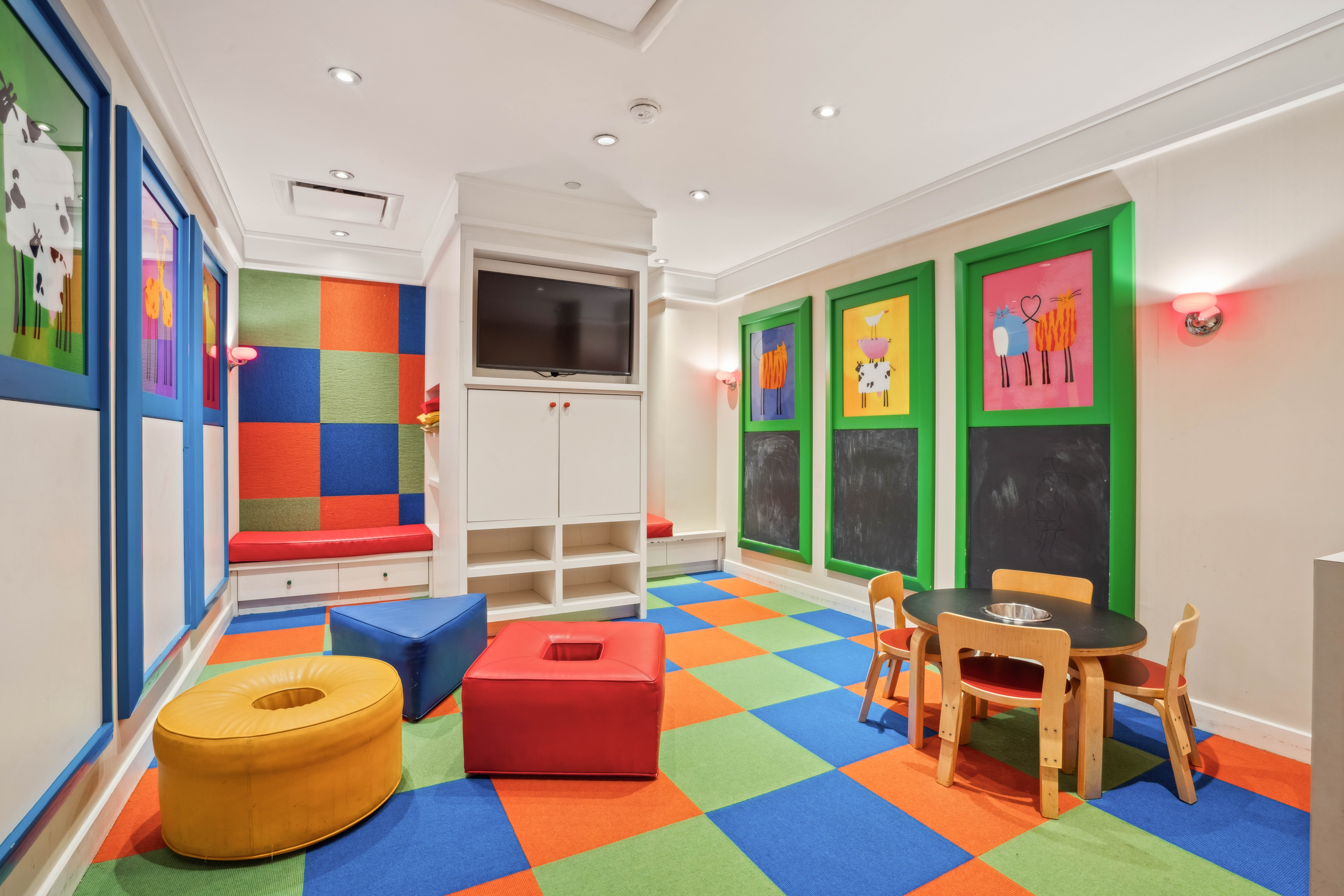 250 East 53rd Street, Unit 1402 Manhattan, NY 10022 - Photo 11 of 13 a very nice looking room with furniture and a rug