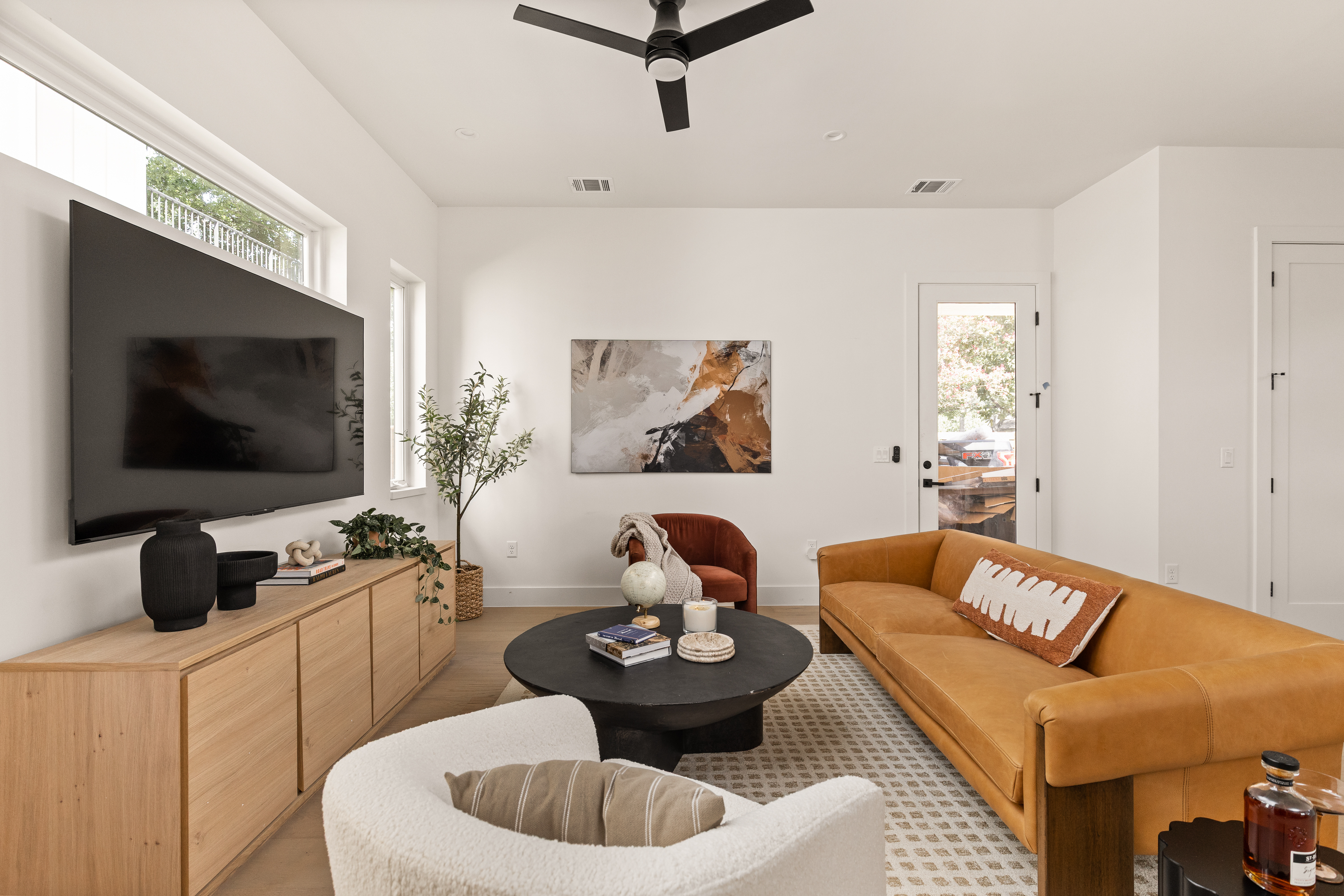 Clawson Road Austin, TX 78745 - Photo 8 of 20 a living room with furniture and a flat screen tv