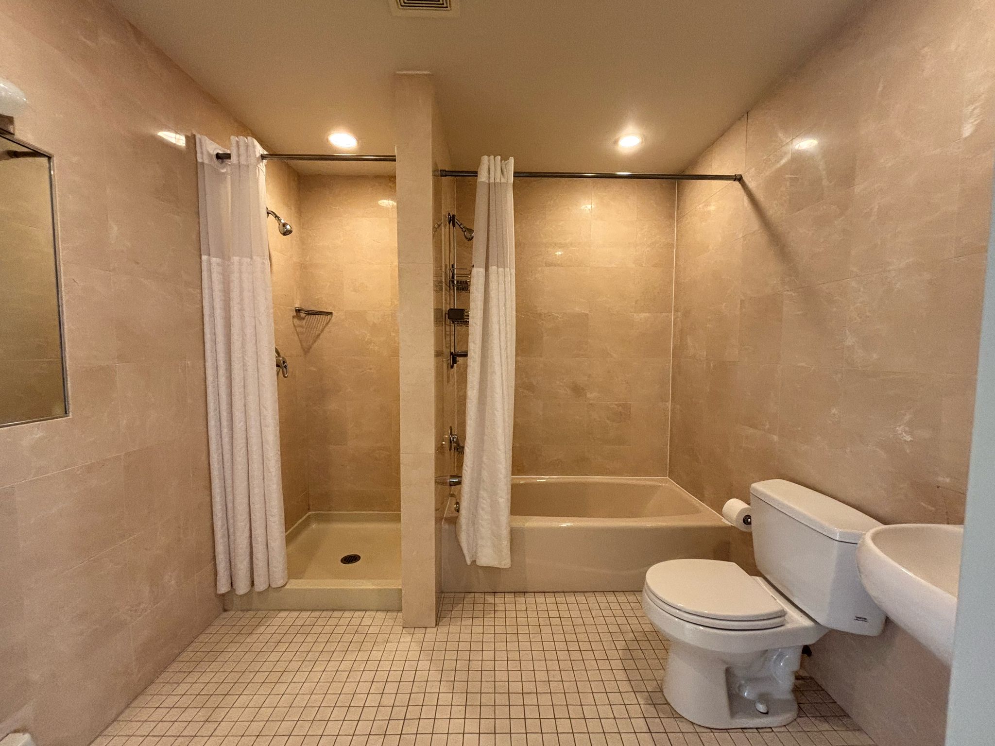 85 Division Street, Unit 4 Manhattan, NY 10002 - Photo 13 of 22 a bathroom with a toilet and a shower
