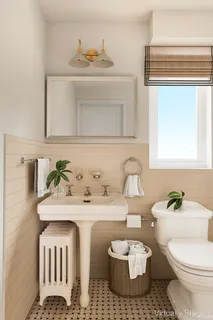 a bathroom with a sink and a toilet