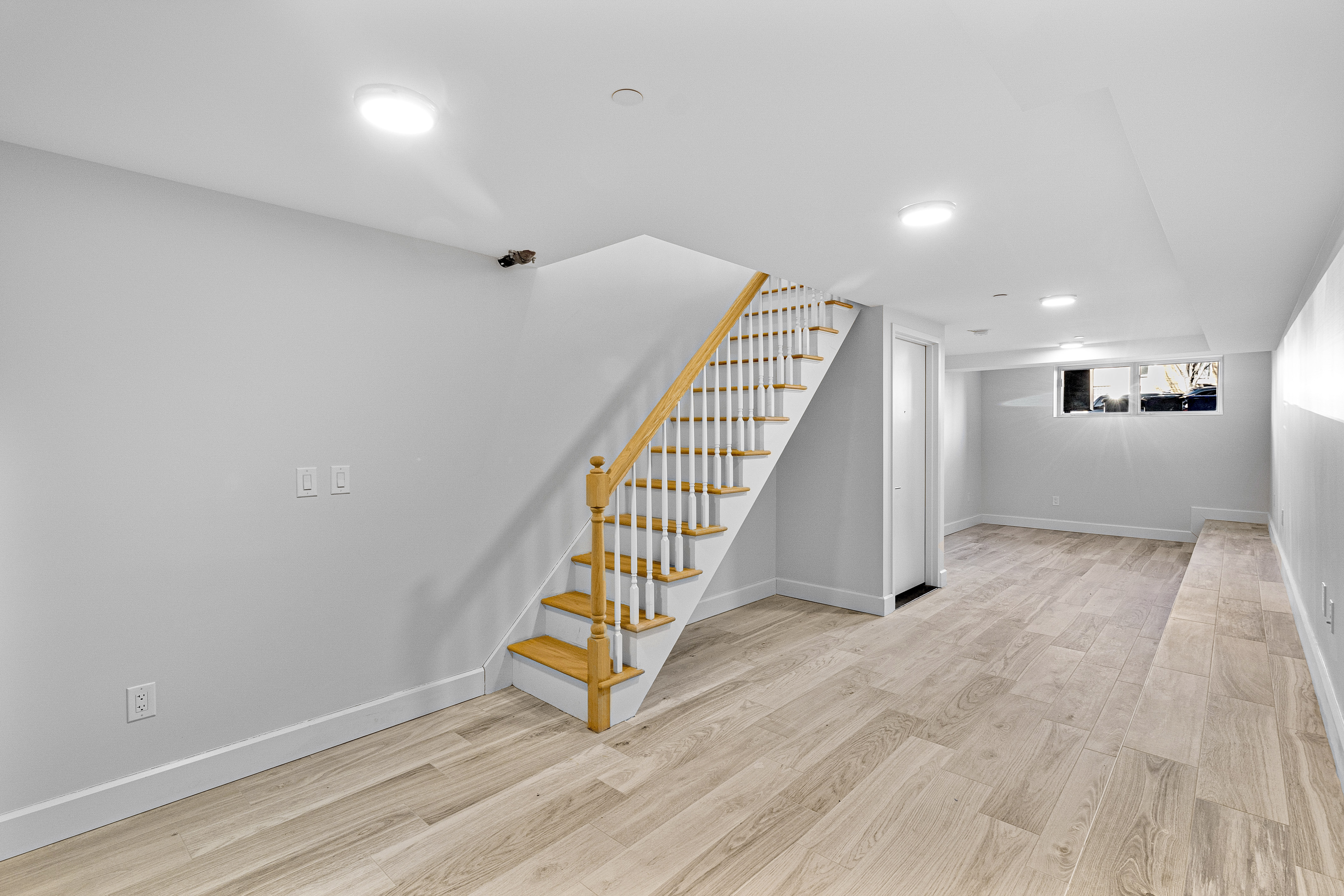 1098 Madison Street, Unit 1A Brooklyn, NY 11221 - Photo 9 of 15 a view of an empty room with stairs