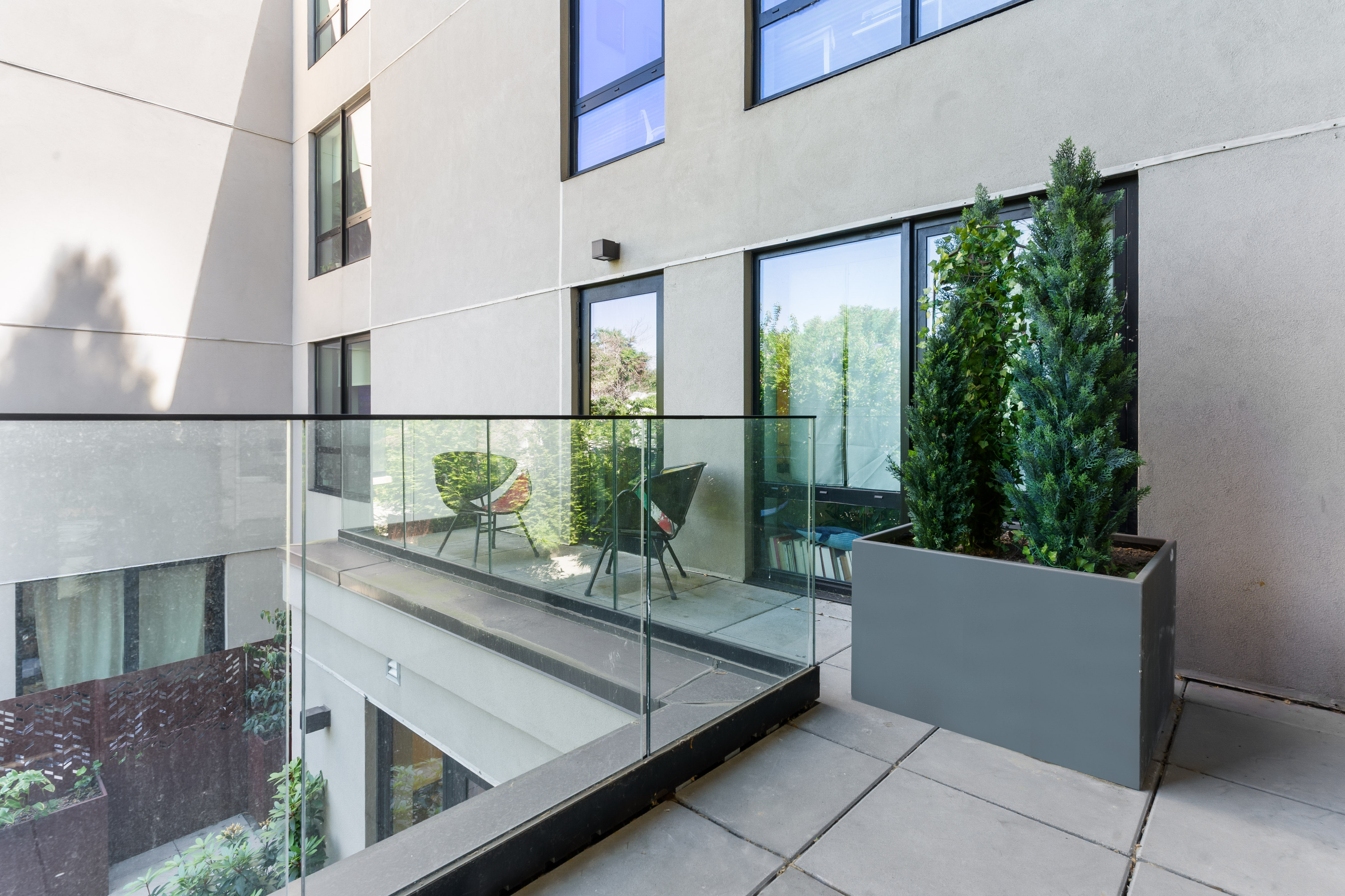 435 Tompkins Avenue, Unit 303 Brooklyn, NY 11216 - Photo 7 of 10 a view of a chairs and table in the balcony