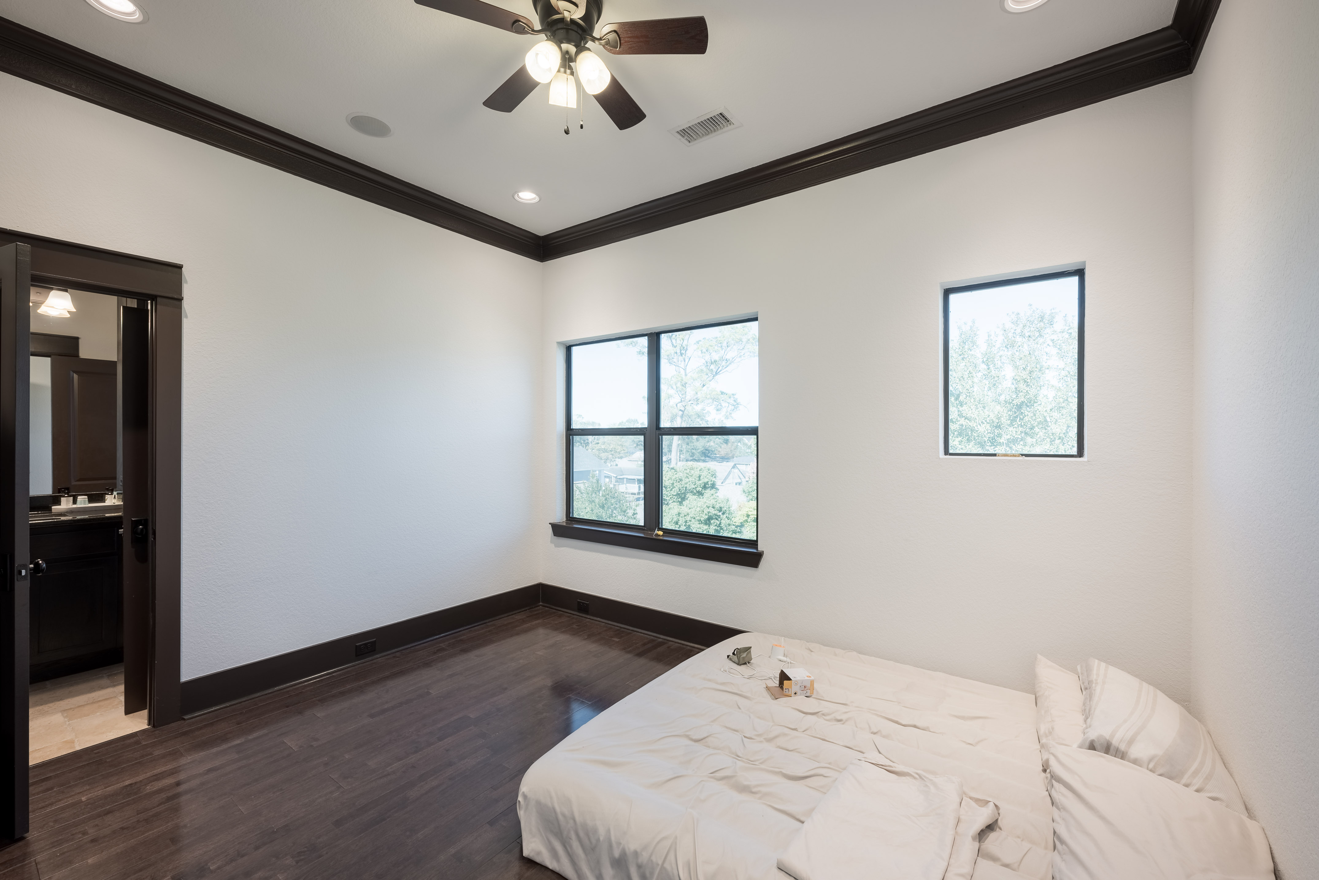 406 Fenn Street Houston, TX 77018 - Photo 26 of 33 a bedroom with a large bed and a window