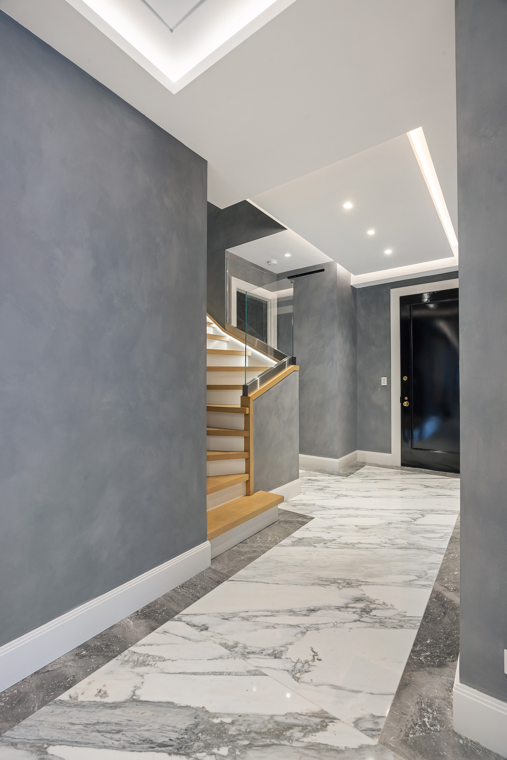 55 Liberty Street, Unit 15 Manhattan, NY 10005 - Photo 21 of 25 a view of a livingroom with wooden floor and staircase
