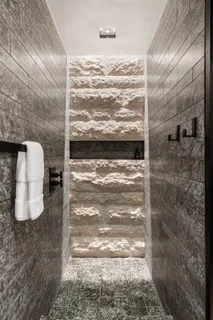 a picture of a rug with a white wall