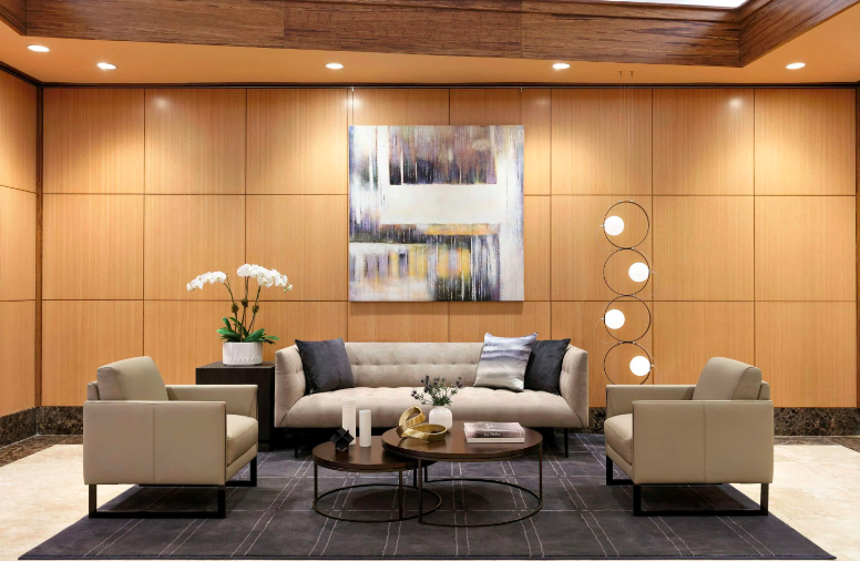 171 East 84th Street, Unit 22C Manhattan, NY 10028 - Photo 12 of 17 a living room with furniture and a large window