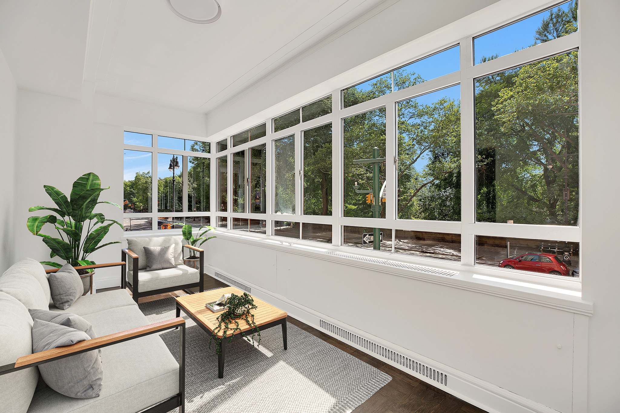 25 Central Park West, Unit 2Q Manhattan, NY 10023 - Photo 5 of 12 a living room with furniture and potted plants