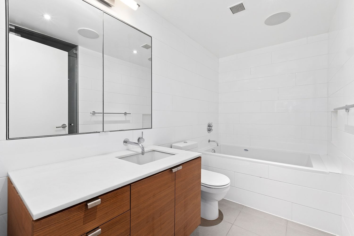 64 Clifton Place, Unit PARLOR Brooklyn, NY 11238 - Photo 11 of 17 a bathroom with a sink a toilet and shower