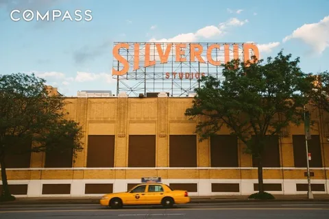 a front view of a building with street view