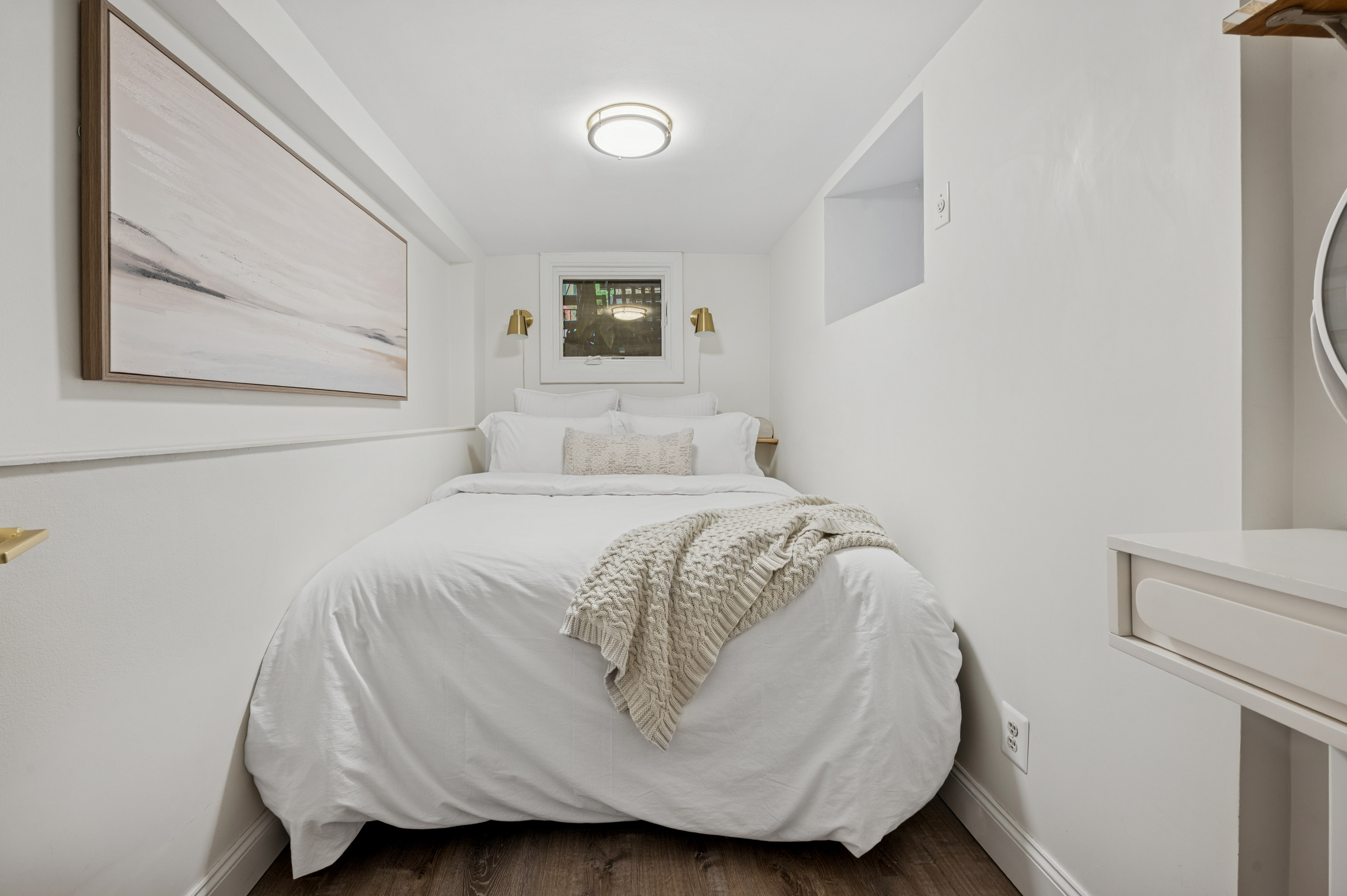 118 West 81st Street, Unit G Manhattan, NY 10024 - Photo 11 of 18 a bedroom with a bed and a wall painting