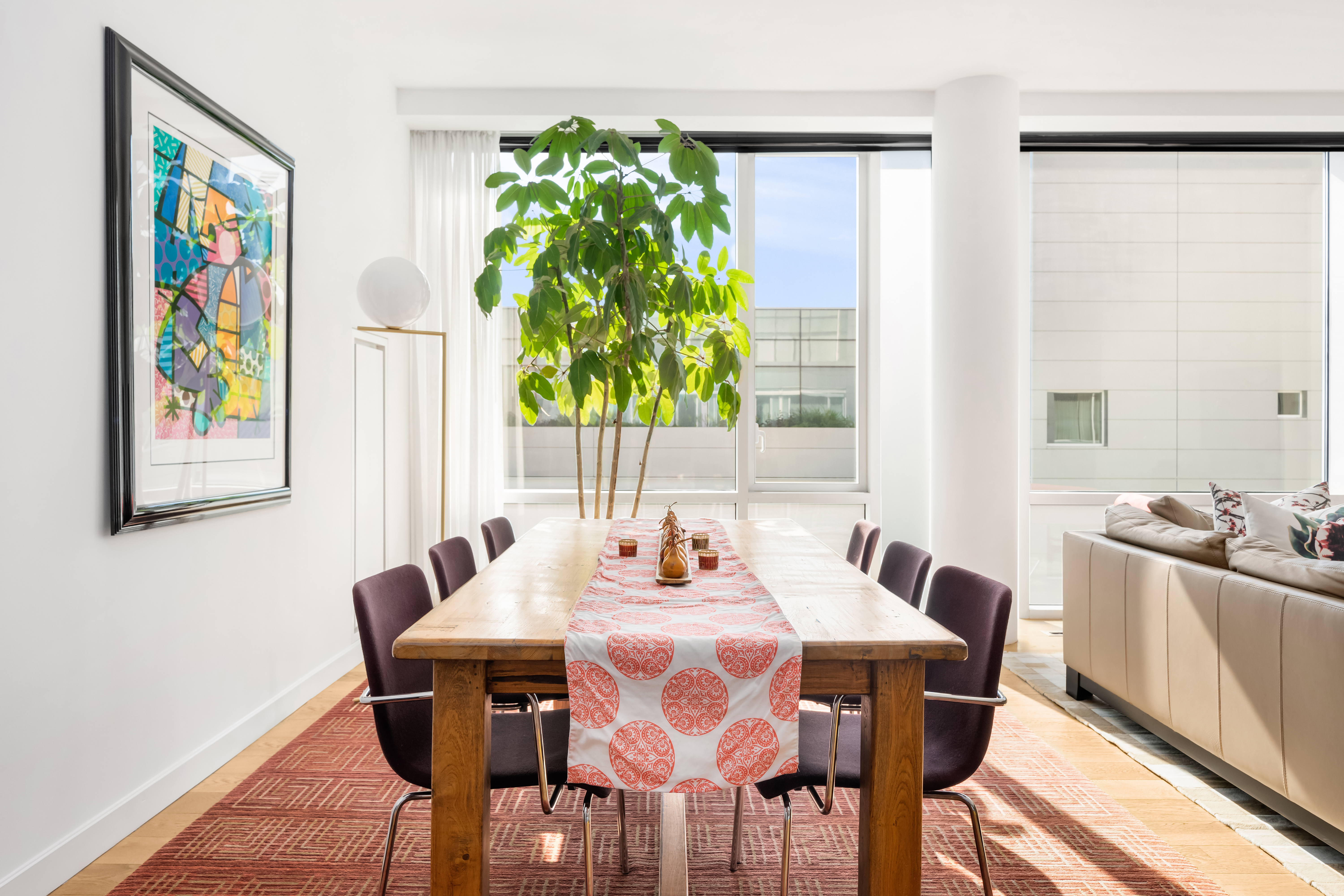 311 West Broadway, Unit 8A Manhattan, NY 10013 - Photo 3 of 10 a view of a dining room with furniture window and wooden floor