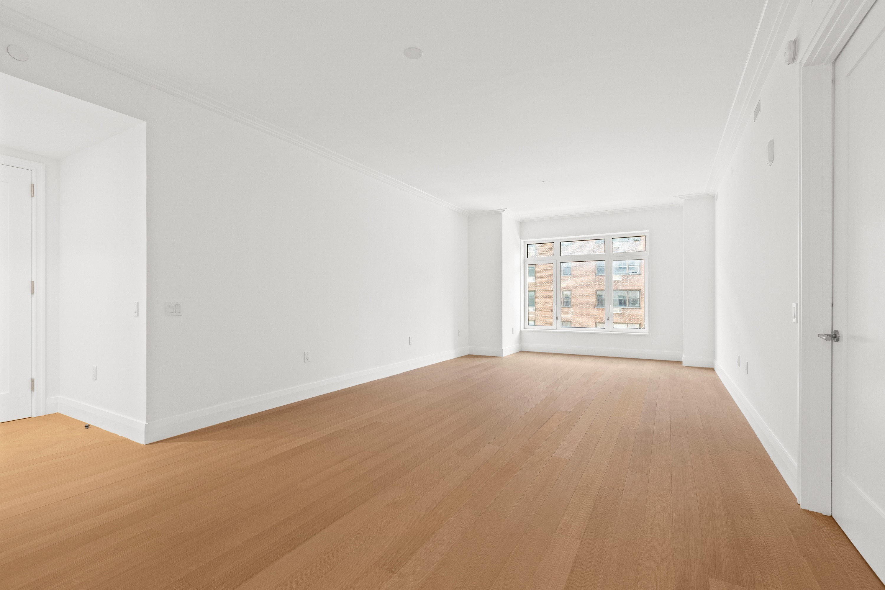 200 East 83rd Street, Unit 5D Manhattan, NY 10028 - Photo 13 of 29 an empty room with windows