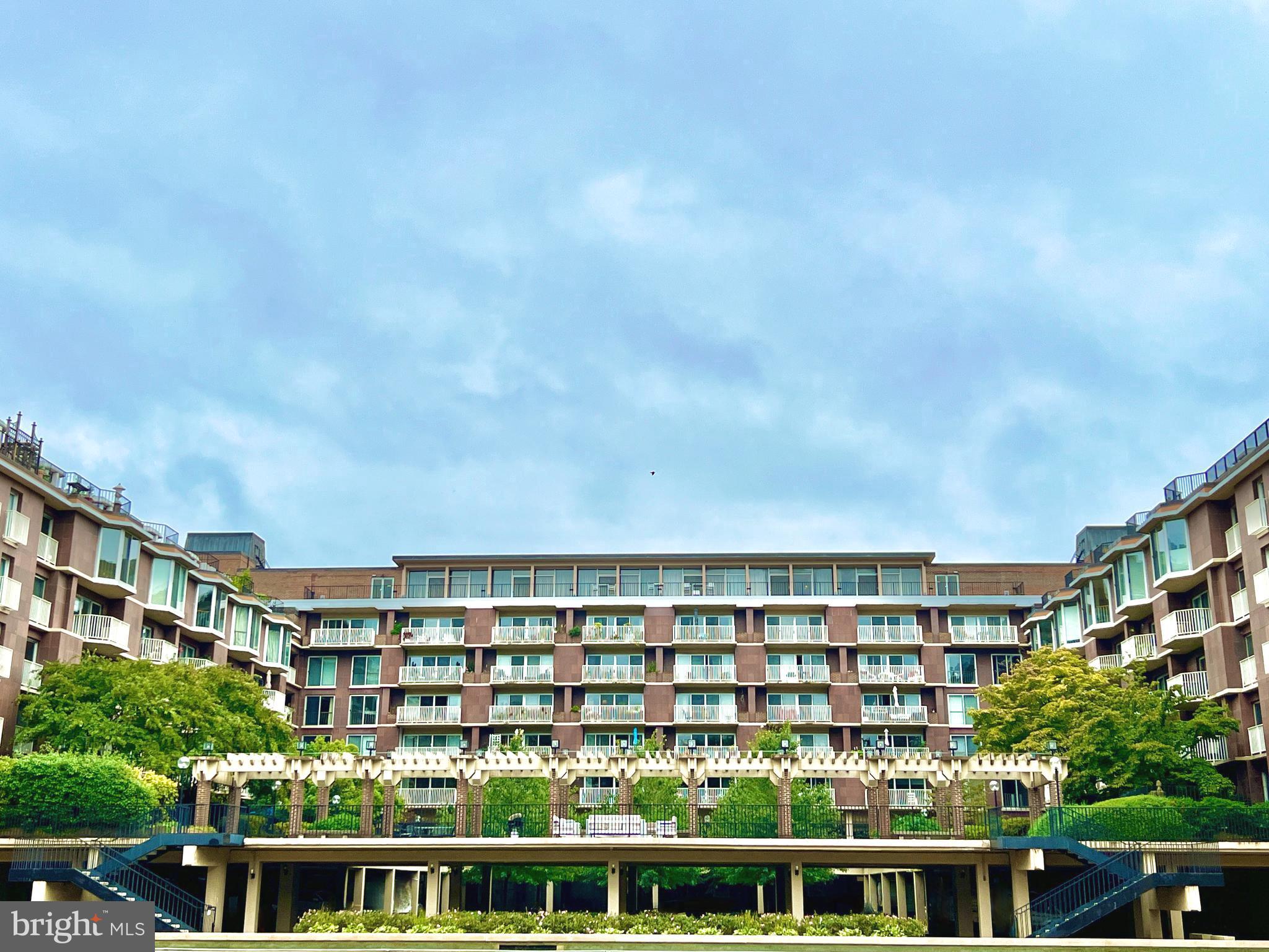 520 N Street Southwest, Unit S622 Washington, DC 20024 - Photo 10 of 25 a view of a large building with a big yard