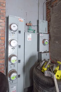 a bathroom with a sink mirror and toilet
