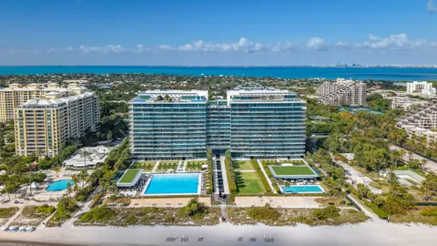 a view of balcony with two chairs and a table