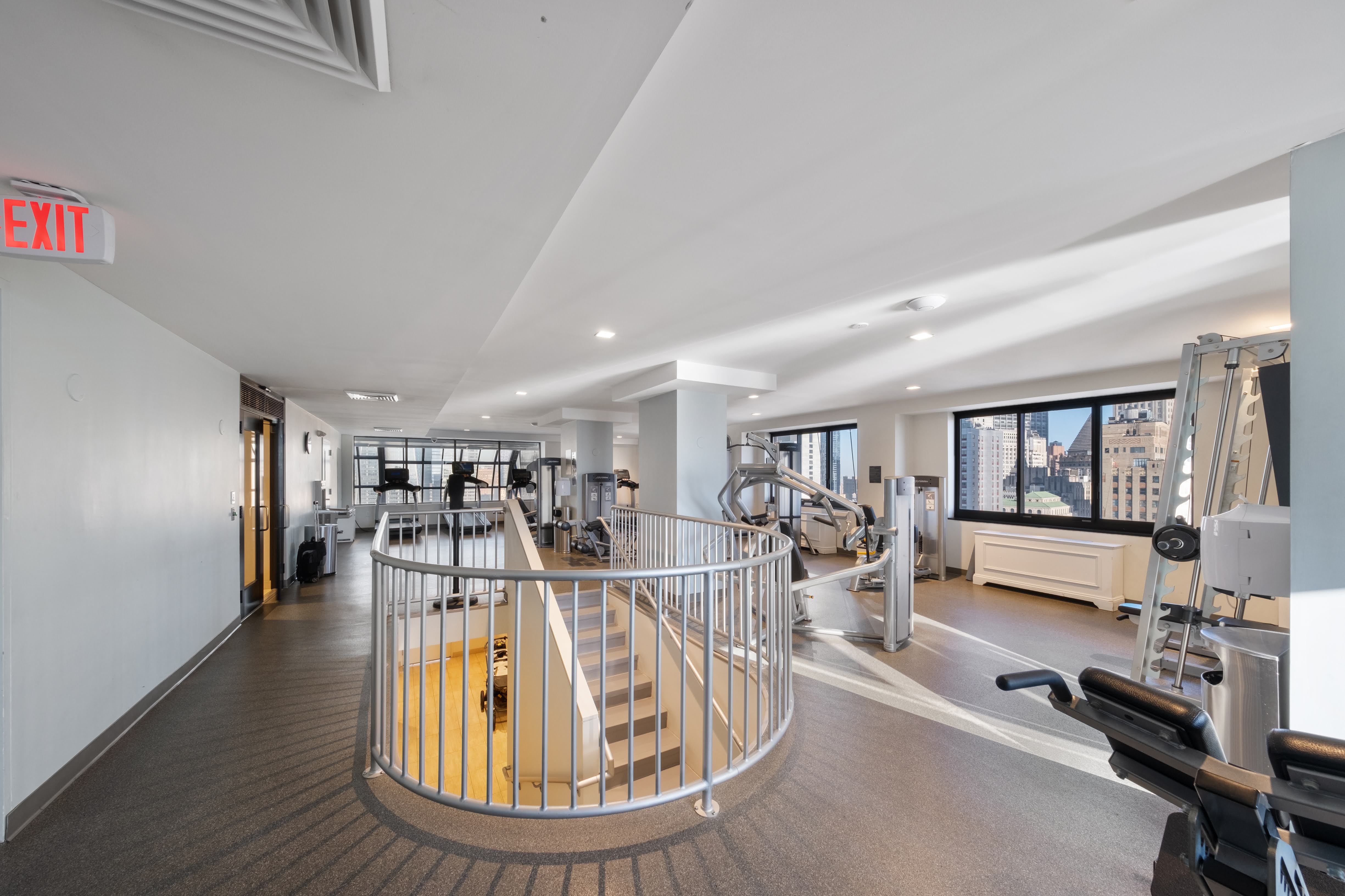 200 Rector Place, Unit 16F Manhattan, NY 10280 - Photo 13 of 25 a view of a room with gym equipment