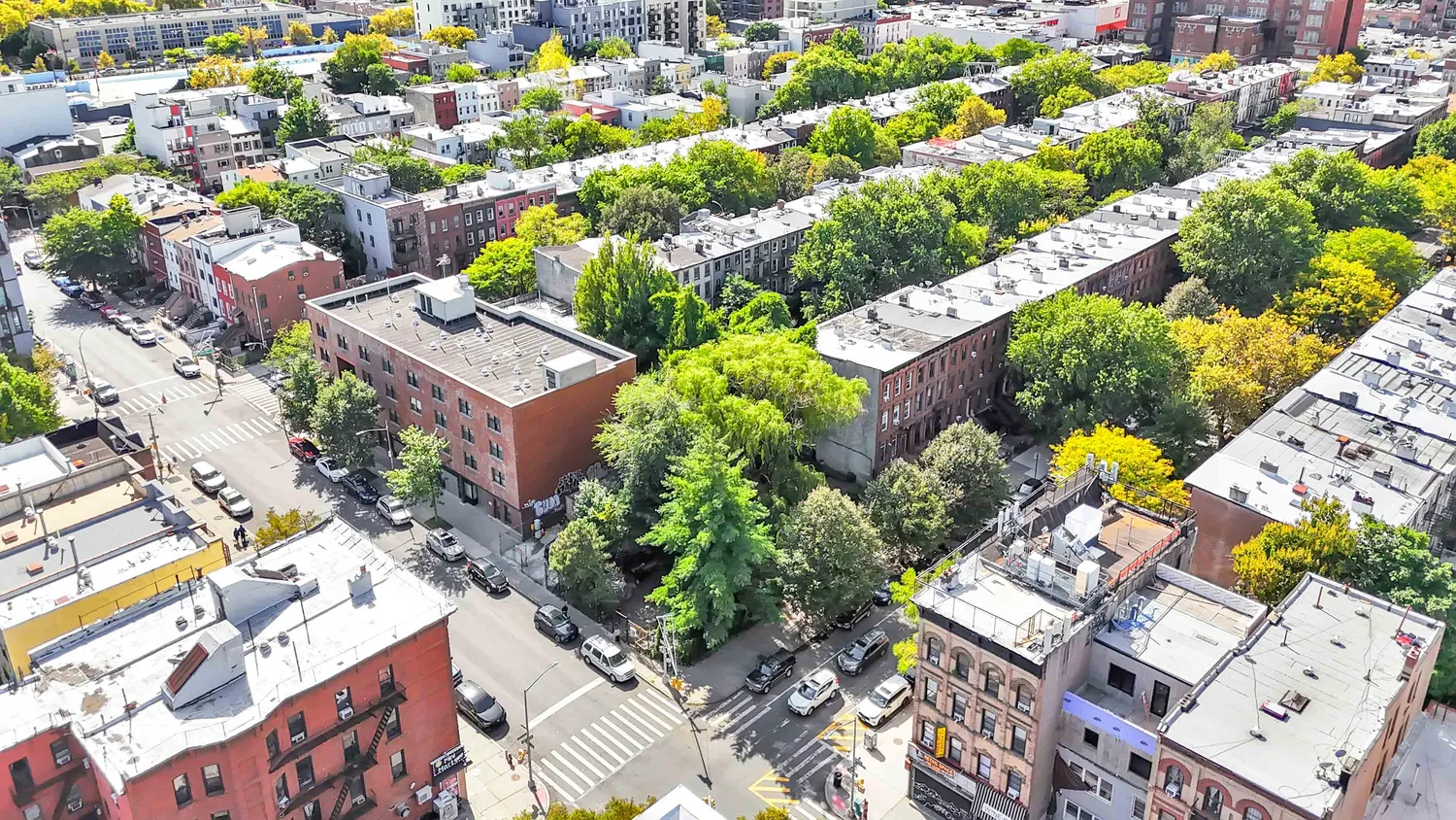 an aerial view of a city with lots of residential buildings