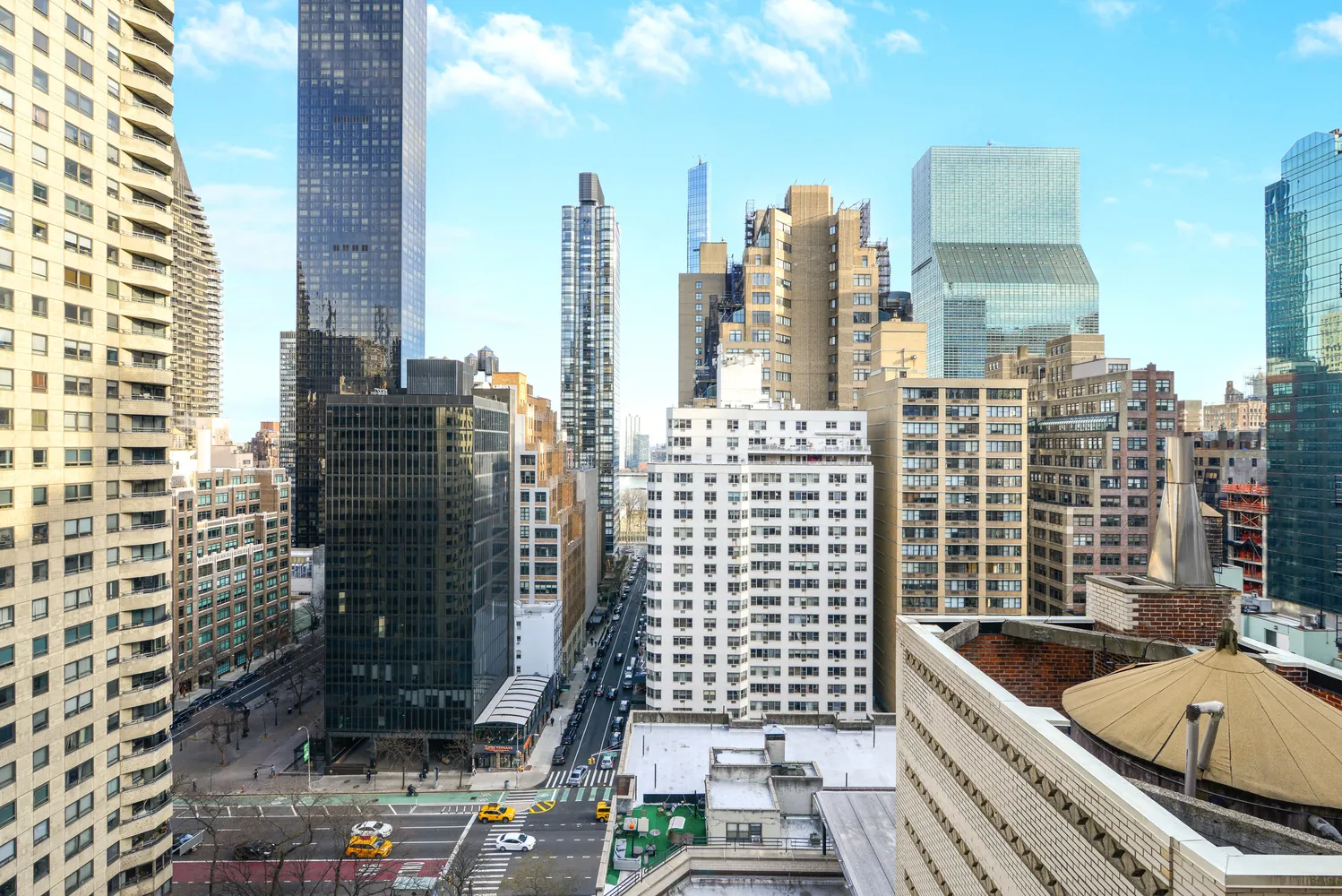 a city view with tall buildings