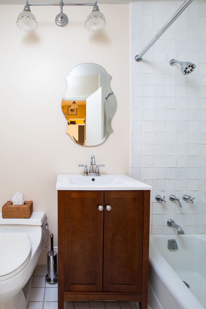 a bathroom with a sink and a mirror