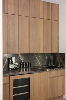 a kitchen with a sink and cabinets