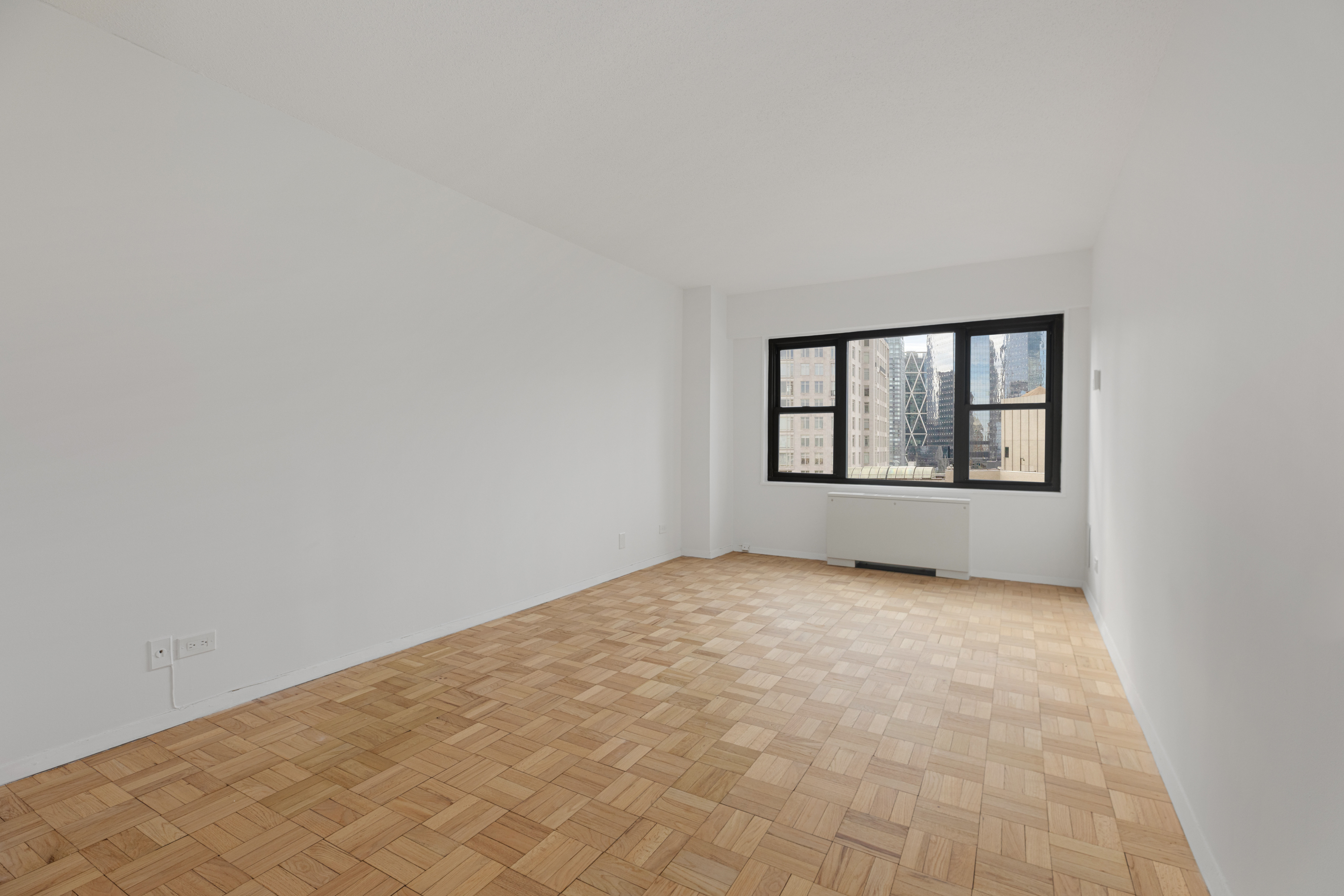 20 West 64th Street, Unit 35T Manhattan, NY 10023 - Photo 5 of 7 an empty room with a window