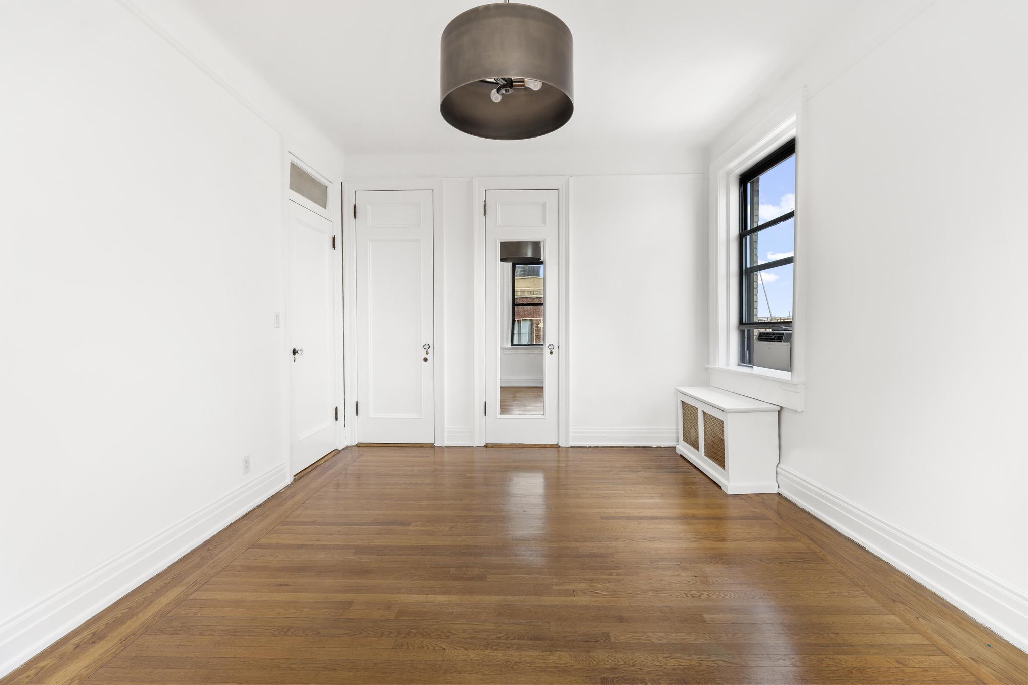 885 West End Avenue, Unit 12D Manhattan, NY 10025 - Photo 13 of 24 a view of an empty room with a window