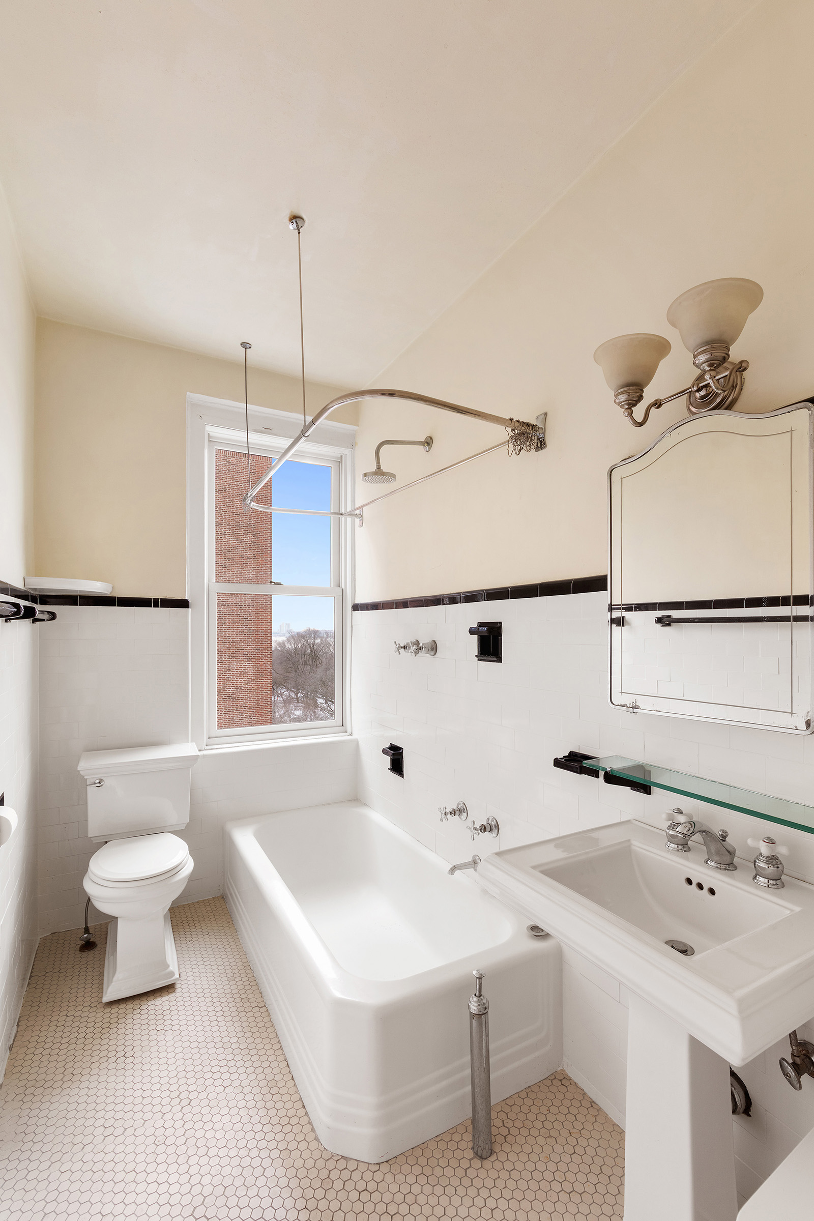 360 Riverside Drive, Unit 8A Manhattan, NY 10025 - Photo 6 of 20 a bathroom with a sink a toilet and shower