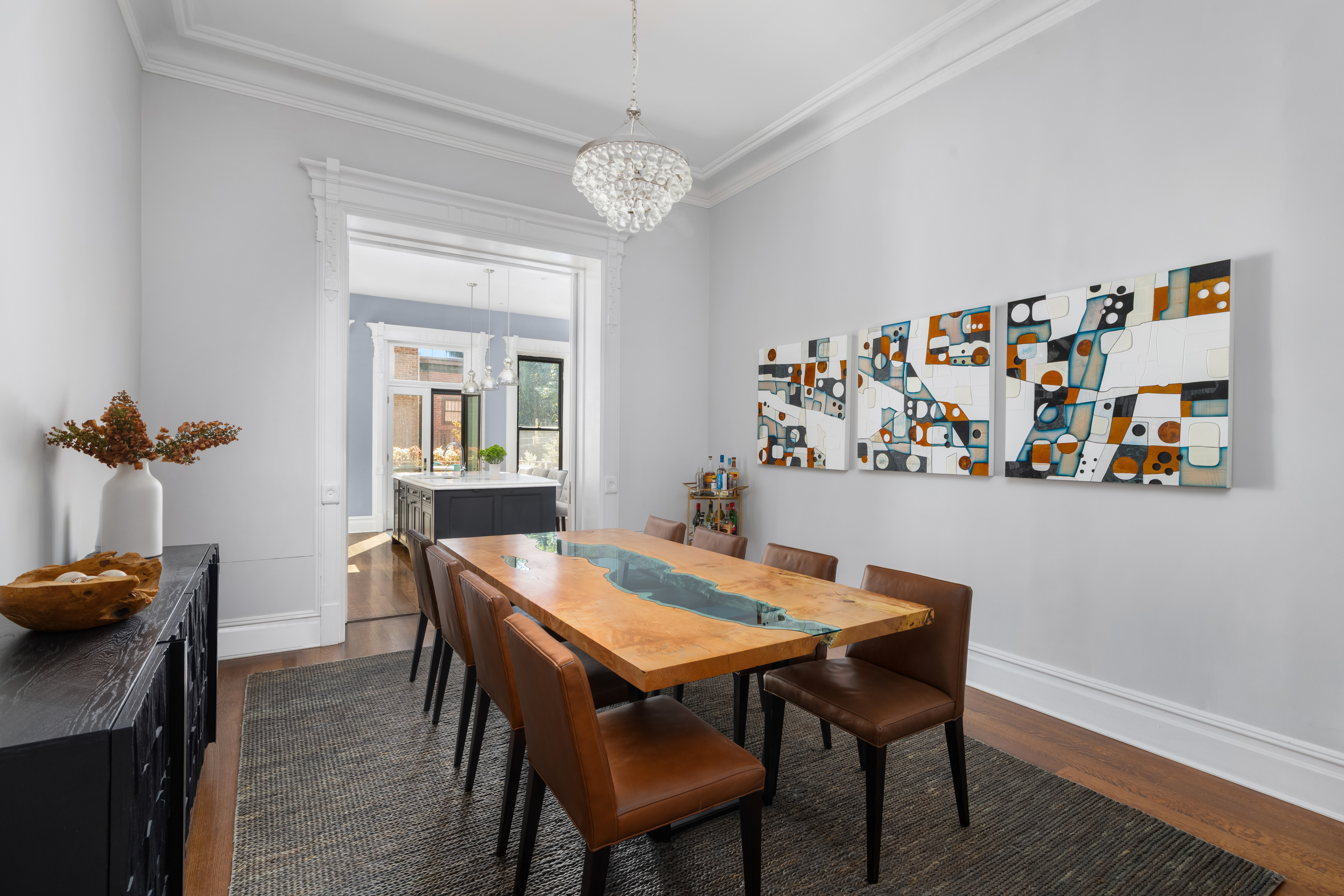 159 6th Avenue, Unit TRIPLEX Brooklyn, NY 11217 - Photo 3 of 19 a view of a dining room with furniture and wooden floor