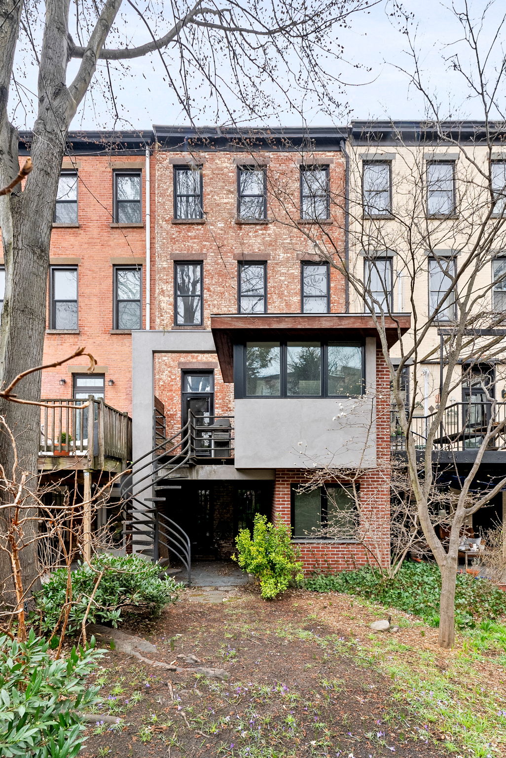 694 10th Street, Unit 2 Brooklyn, NY 11215 - Photo 20 of 22 front view of residential houses with a yard