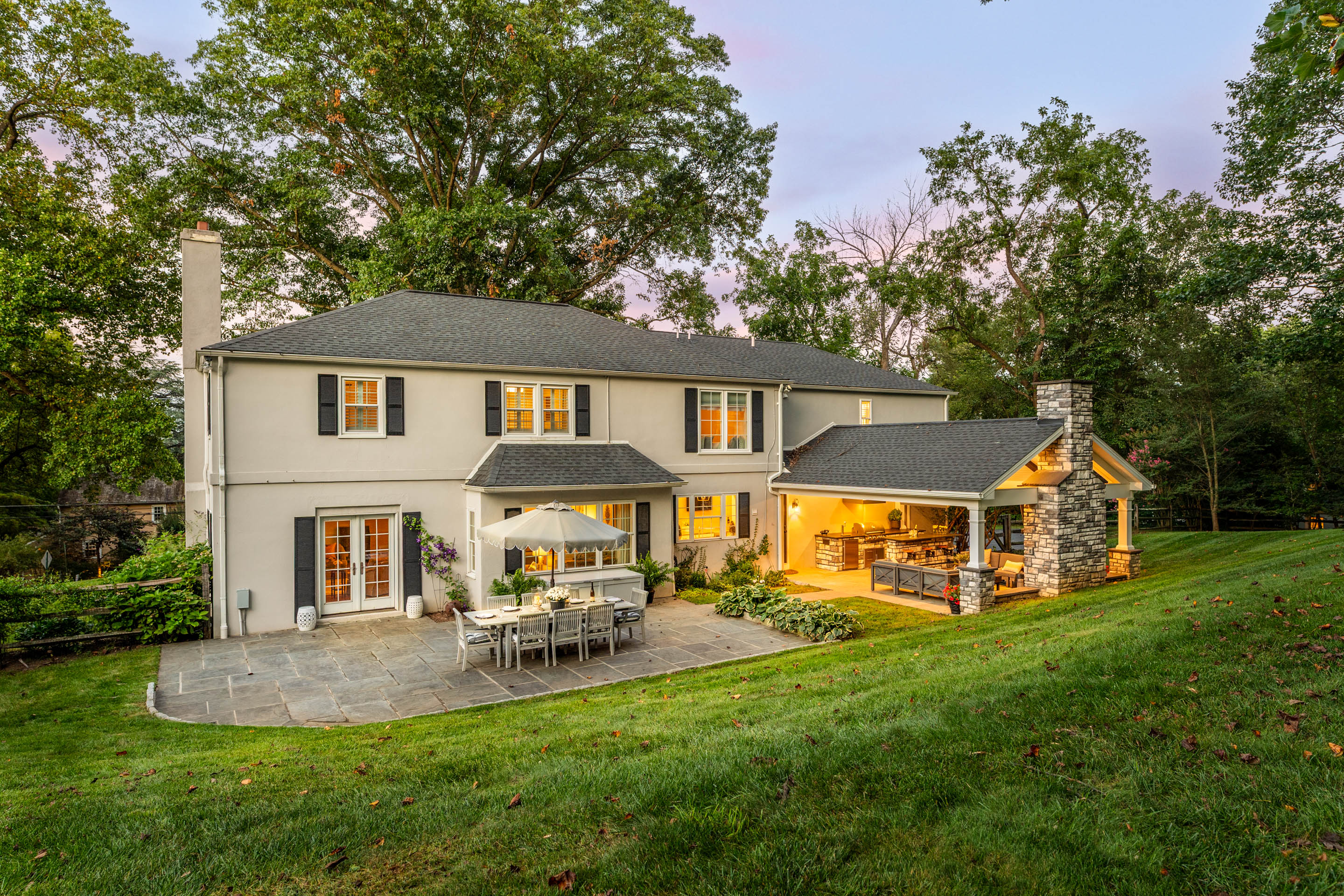 710 South Valley Forge Road Devon, PA 19333 - Photo 40 of 47 a view of a white house with a big yard and large trees