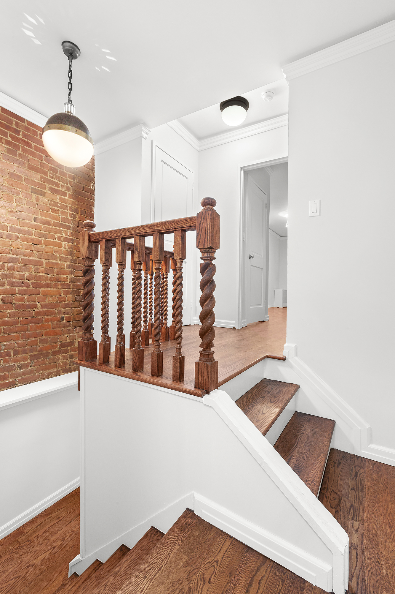 522 East 82nd Street, Unit 1 Manhattan, NY 10028 - Photo 7 of 16 a view of kitchen with furniture and wooden floor