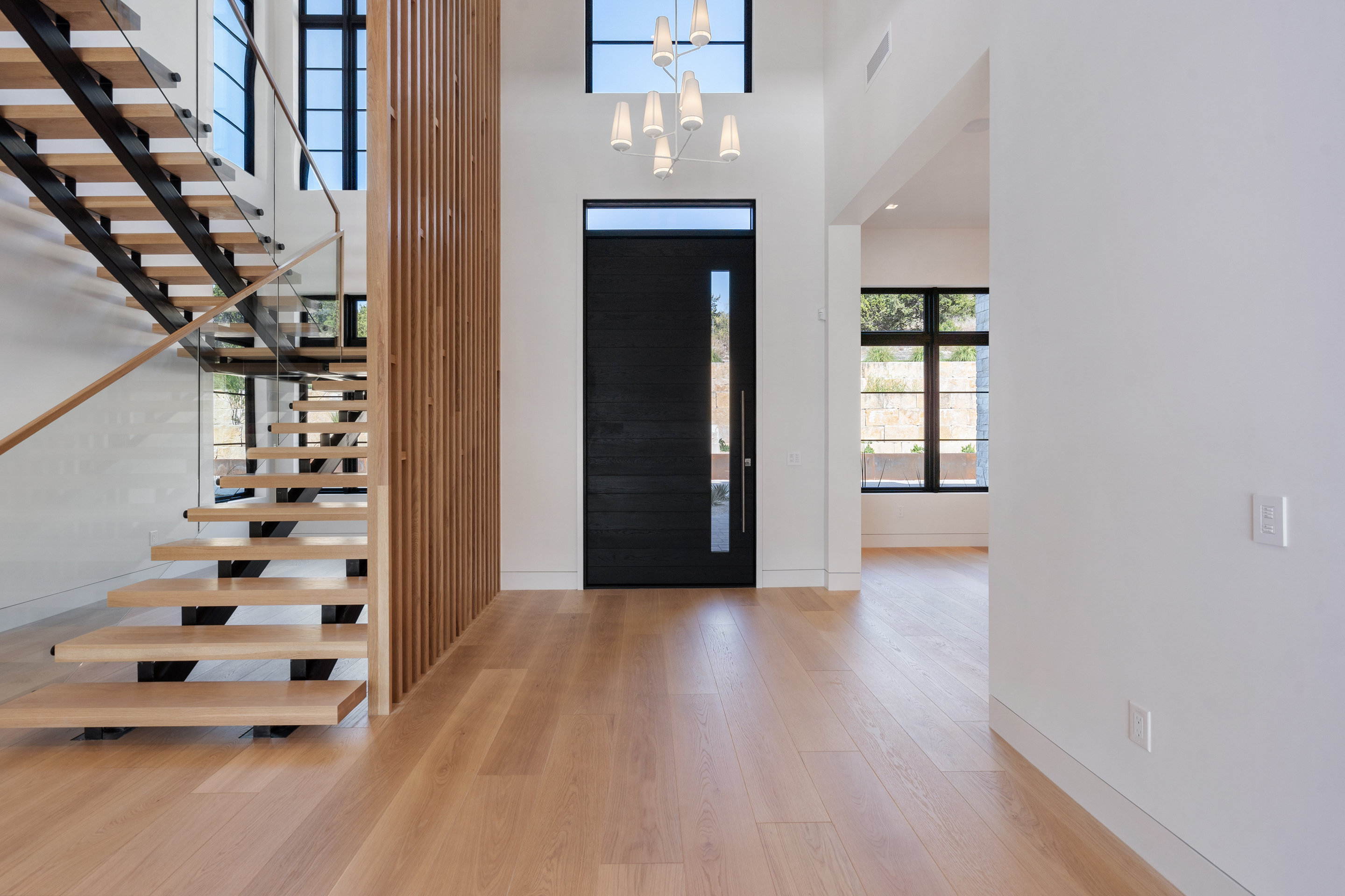 1905 Hallam Drive Austin, TX 78746 - Photo 5 of 39 wooden floor in an empty room with a window