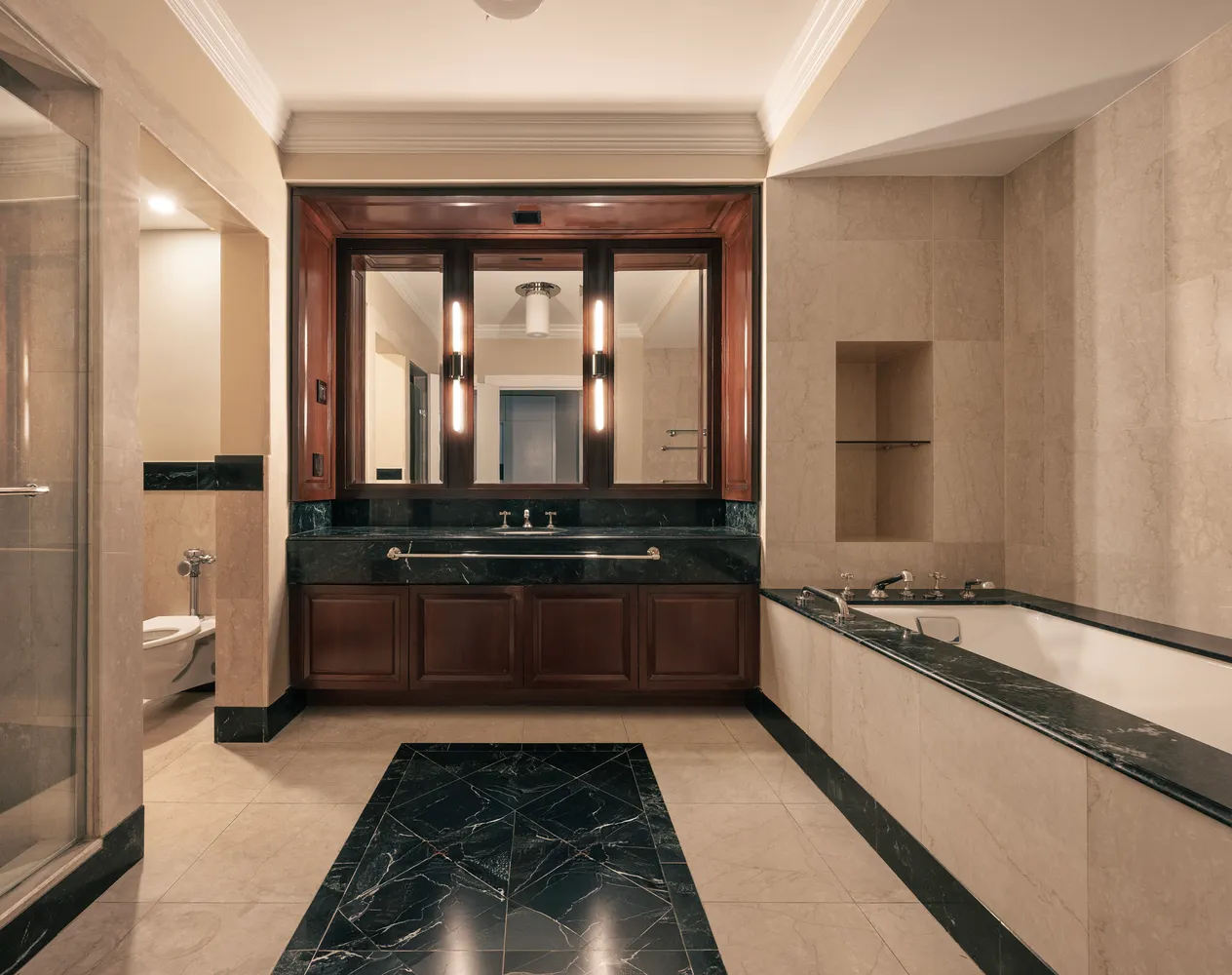 a large kitchen with granite countertop a stove and a bathtub