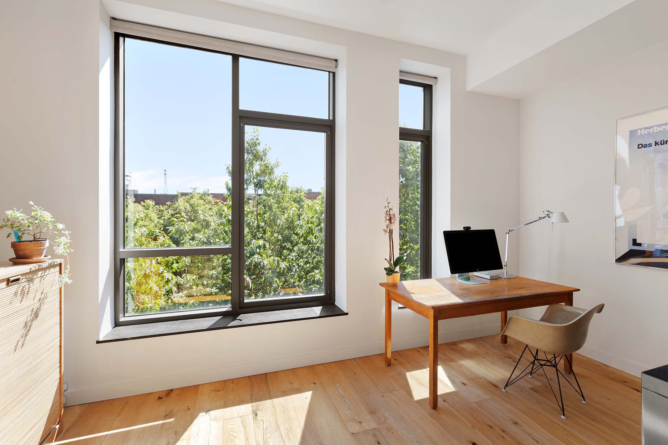 27 Clermont Avenue Brooklyn, NY 11205 - Photo 12 of 19 a view of a workspace with furniture and a window
