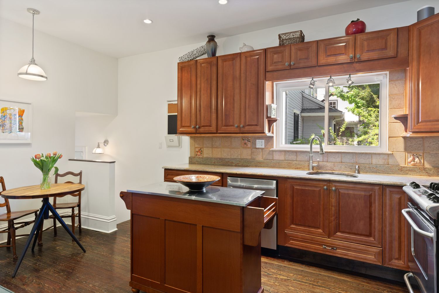 685 East 22nd Street Brooklyn, NY 11210 - Photo 12 of 43 a kitchen with a sink stove and cabinets