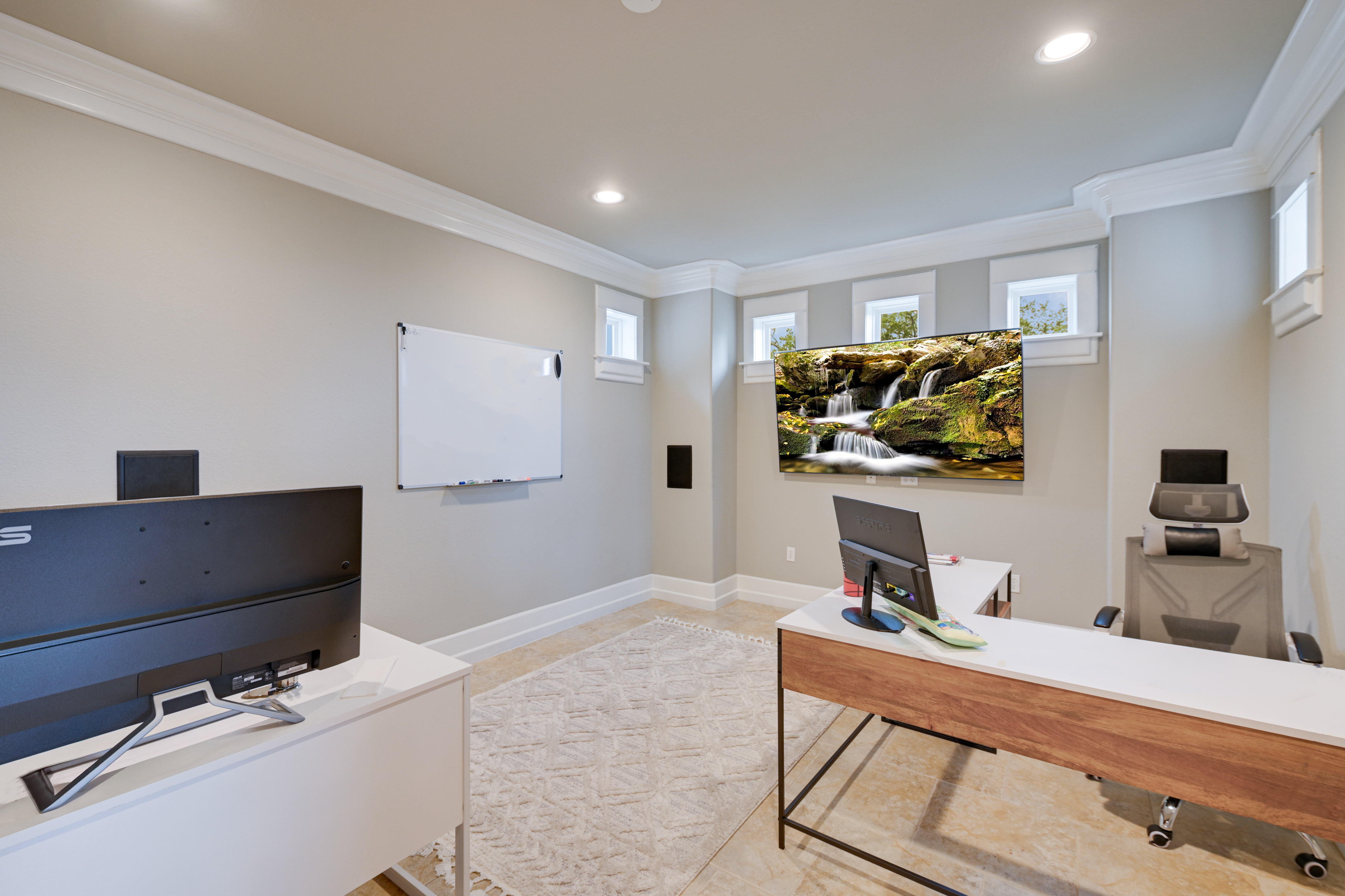 14913 Murfin Road Austin, TX 78734 - Photo 12 of 40 a living room with furniture and a flat screen tv