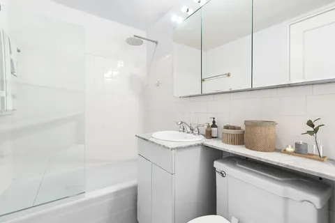 a bathroom with a sink and a bathtub