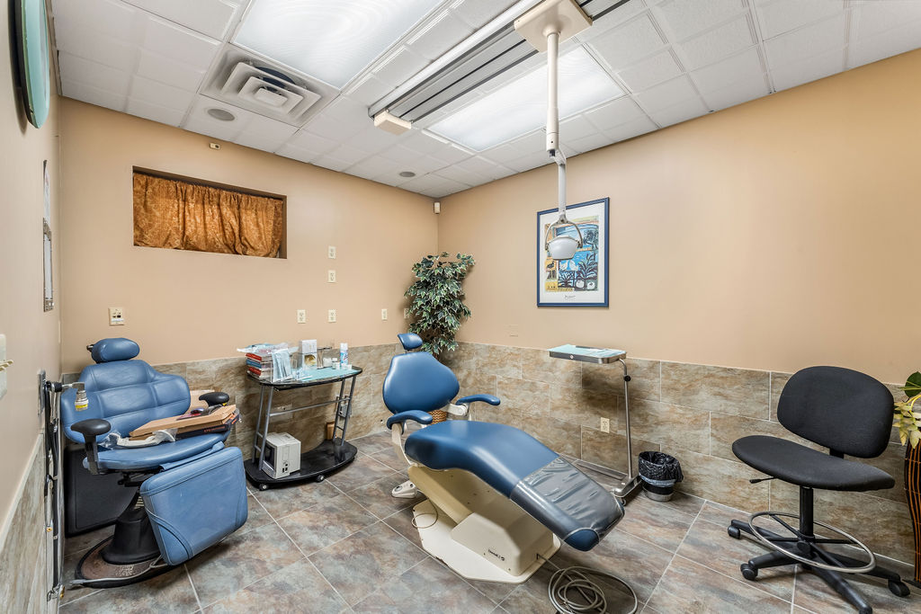 869 Bergen Avenue, Unit COMMERCIAL Jersey City, NJ 07306 - Photo 16 of 26 a work room with furniture and gym equipment