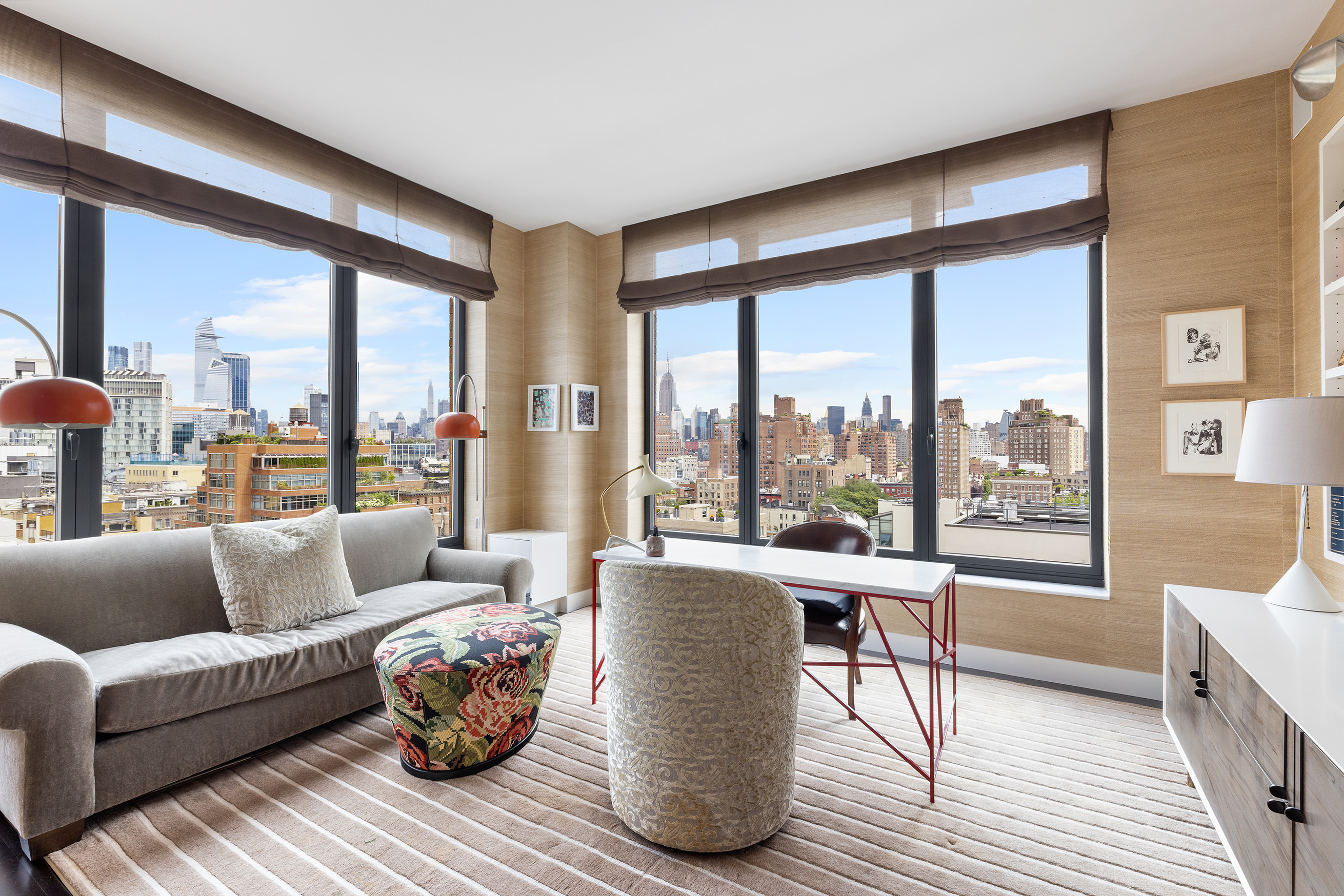400 West 12th Street, Unit 12C Manhattan, NY 10014 - Photo 14 of 24 a living room with furniture and a large window