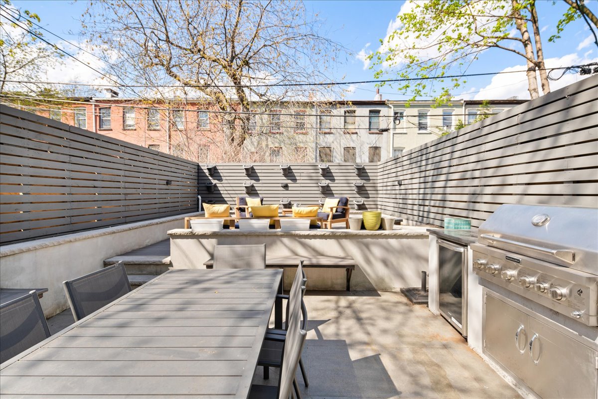 577 Madison Street, Unit 1B Brooklyn, NY 11221 - Photo 6 of 15 a view of balcony with chairs