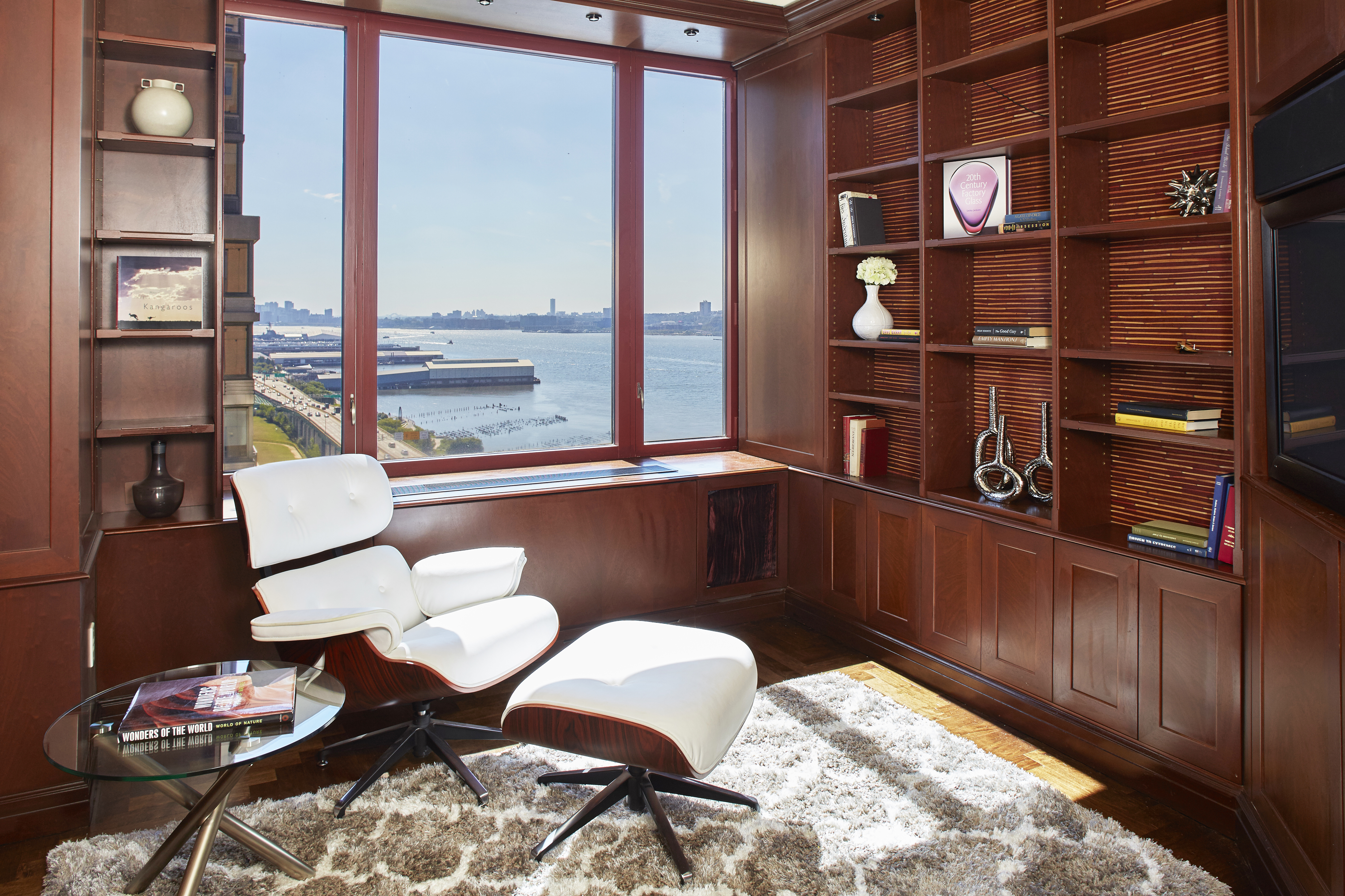 220 Riverside Boulevard, Unit 19JG Manhattan, NY 10069 - Photo 5 of 13 a living room with furniture