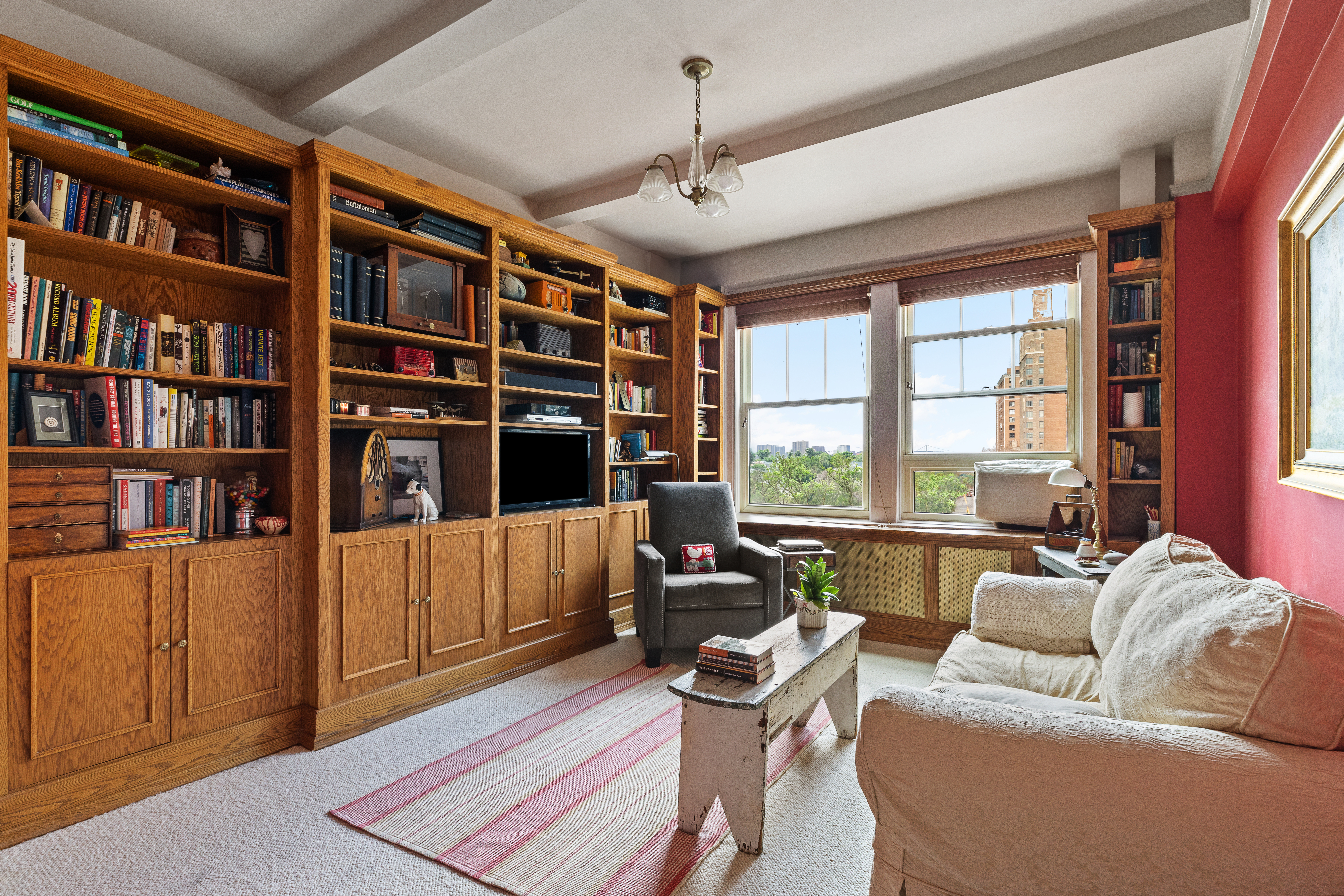 330 West 72nd Street, Unit 7A Manhattan, NY 10023 - Photo 5 of 10 a living room with furniture and a window