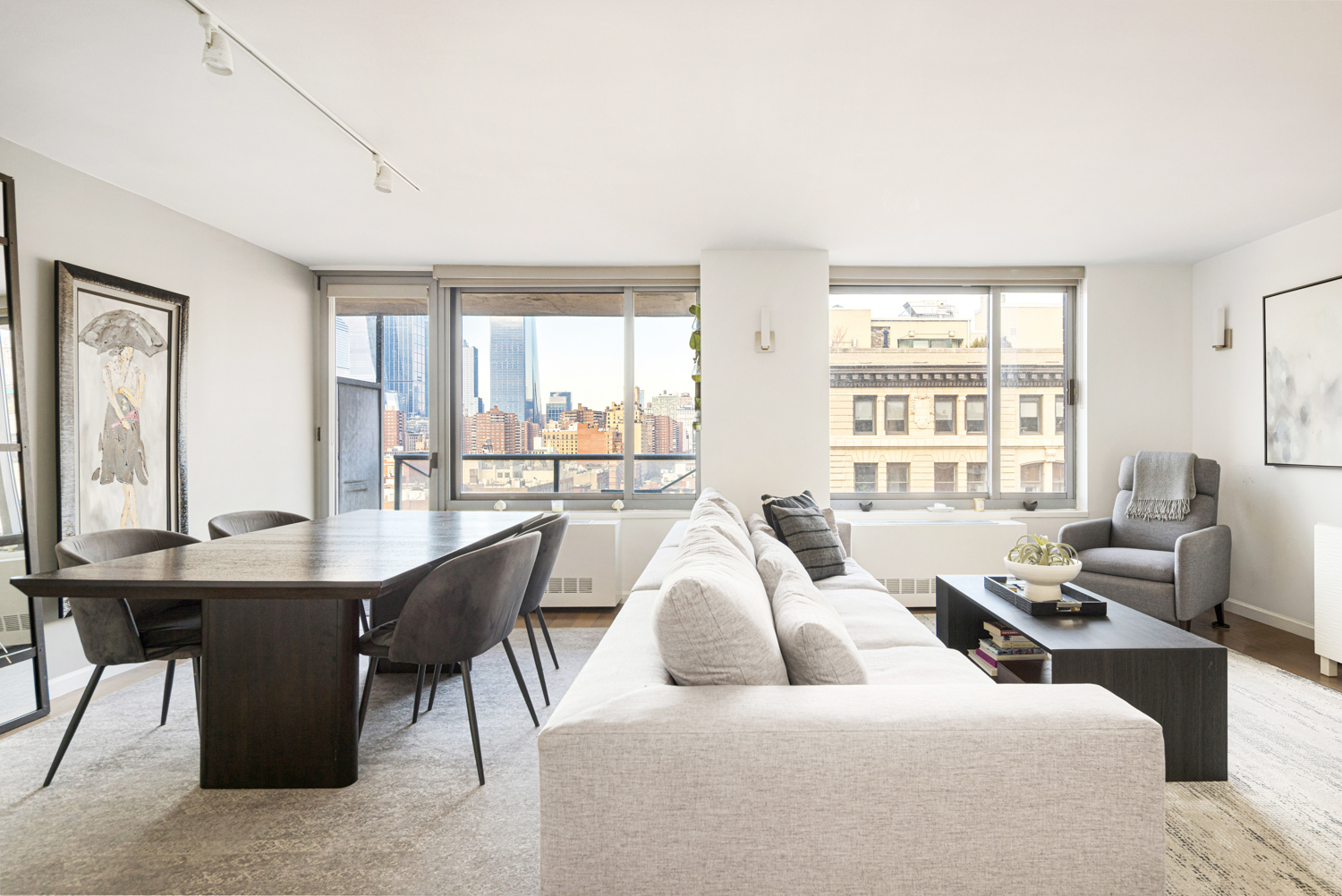 270 West 17th Street, Unit 11BC Manhattan, NY 10011 - Photo 10 of 13 a living room with furniture and large windows